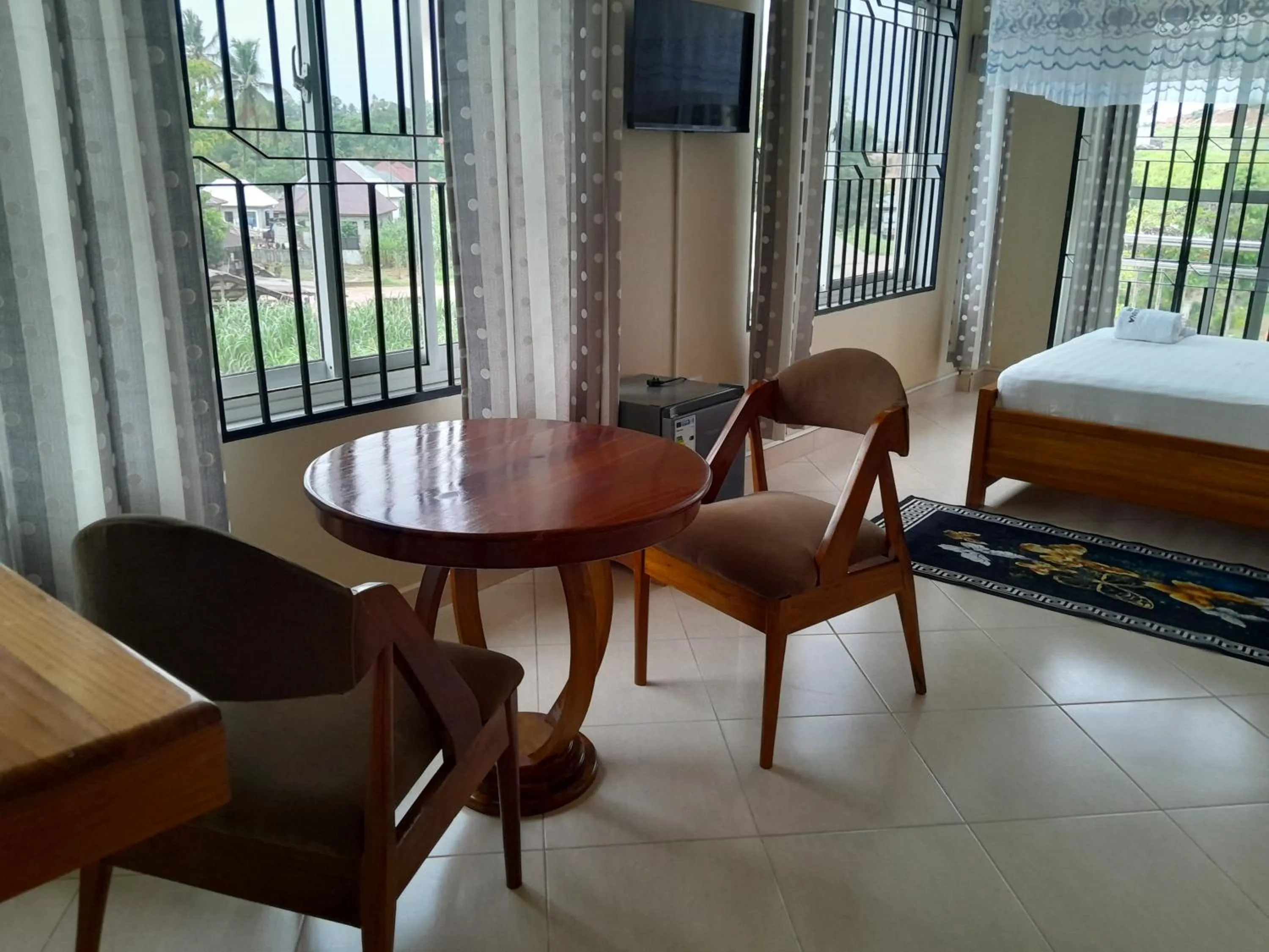 Bed in WILIVINA HOTEL