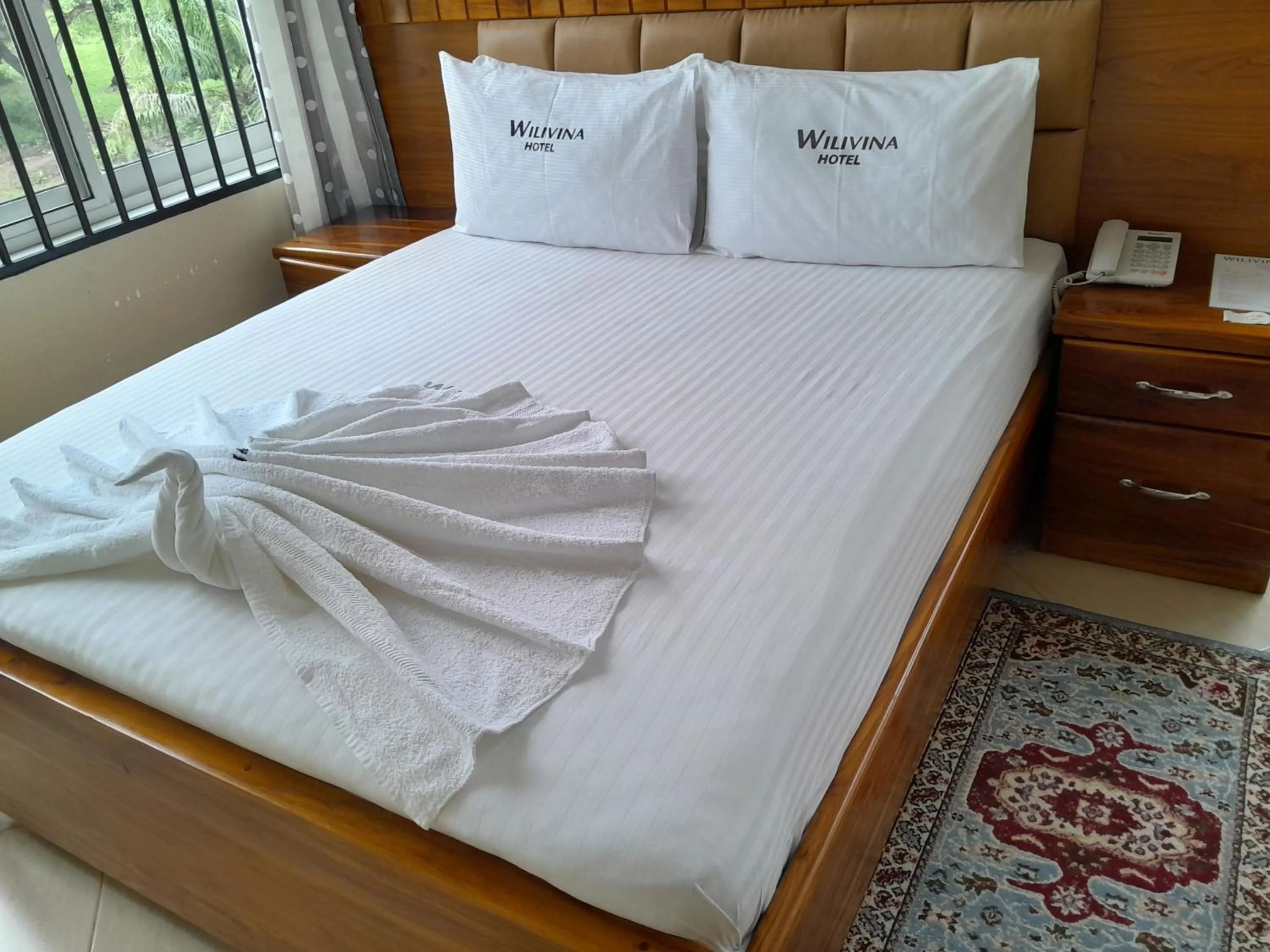 Bed in WILIVINA HOTEL