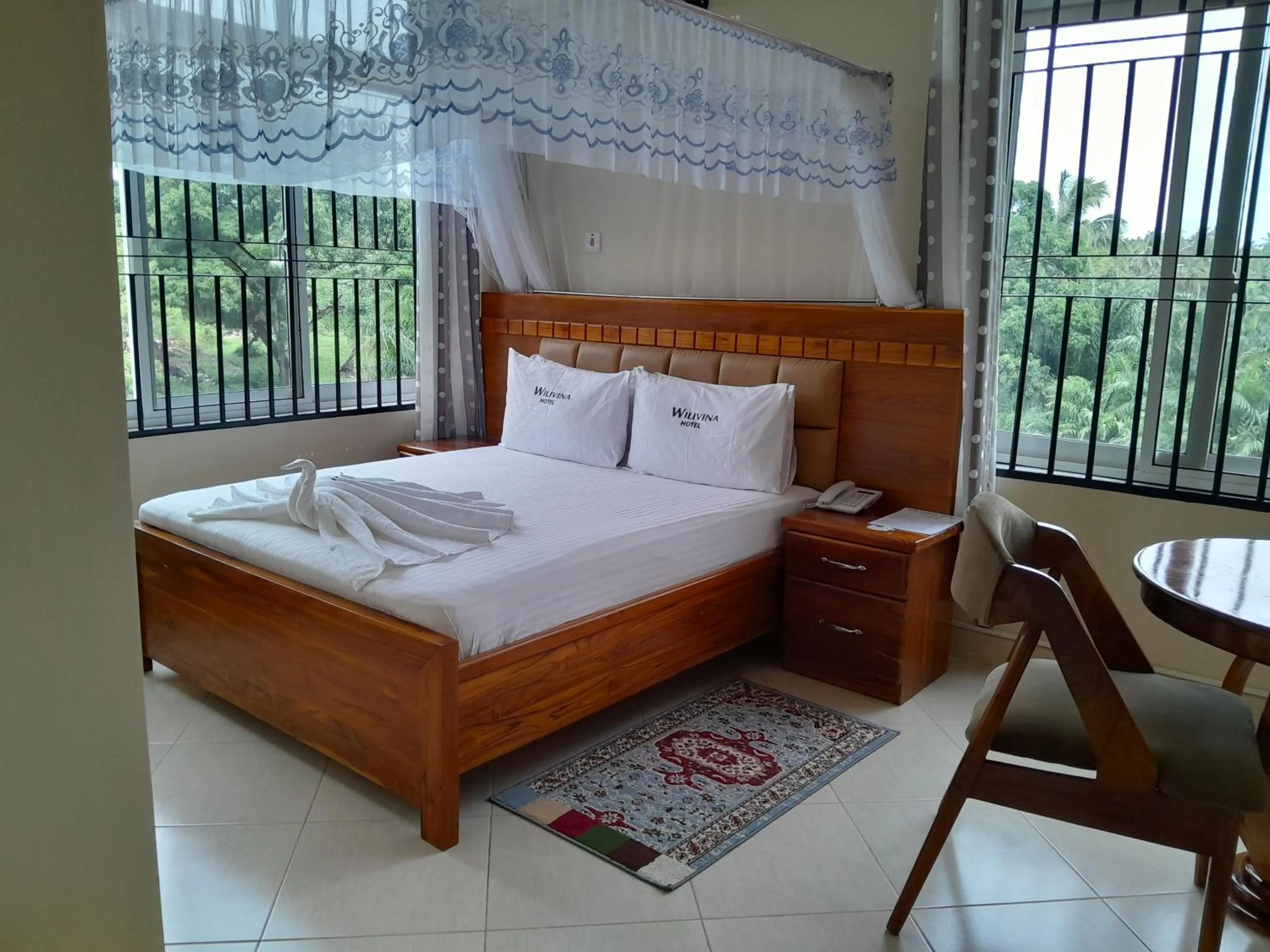 Bed in WILIVINA HOTEL