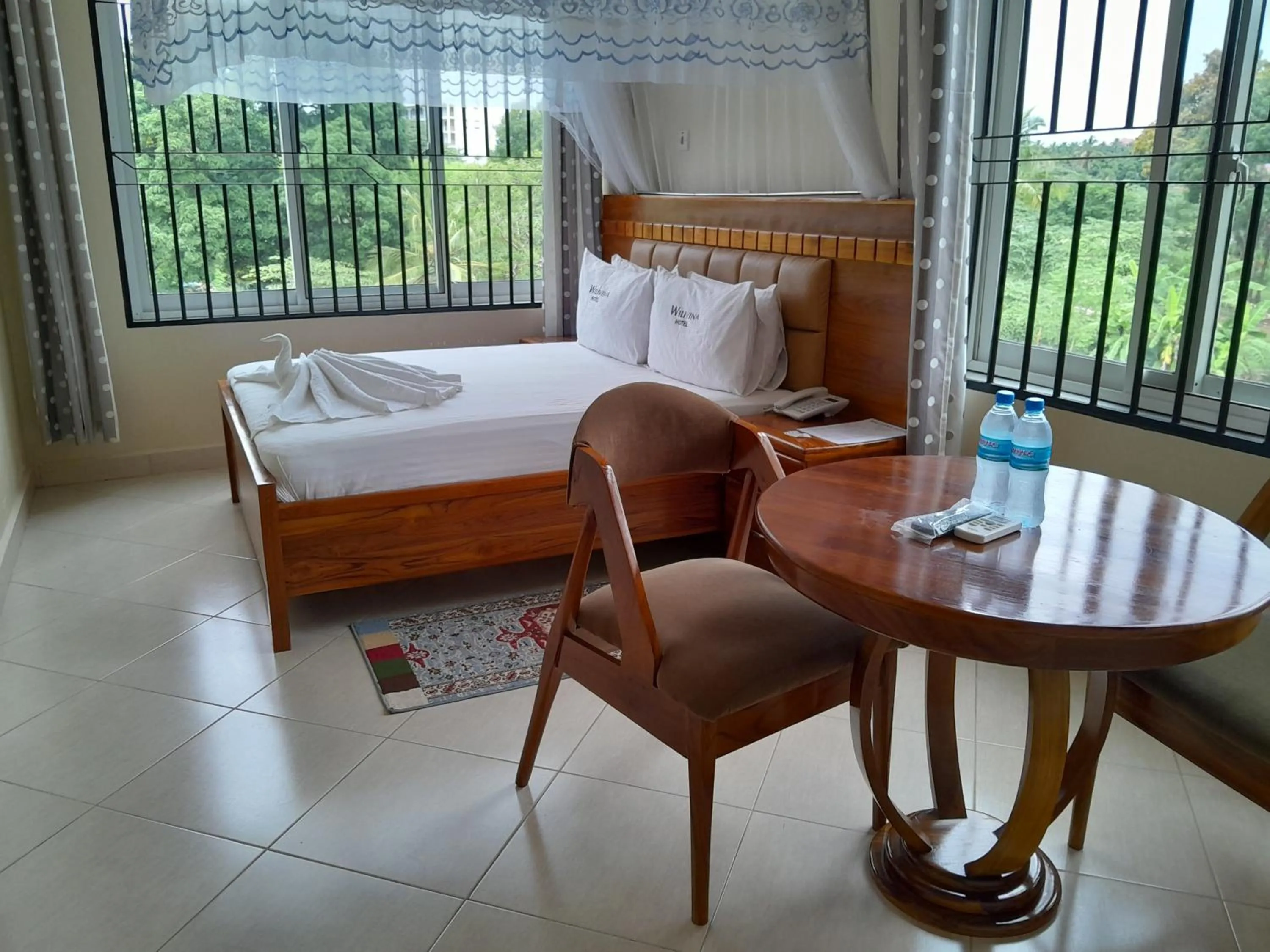 Bed in WILIVINA HOTEL