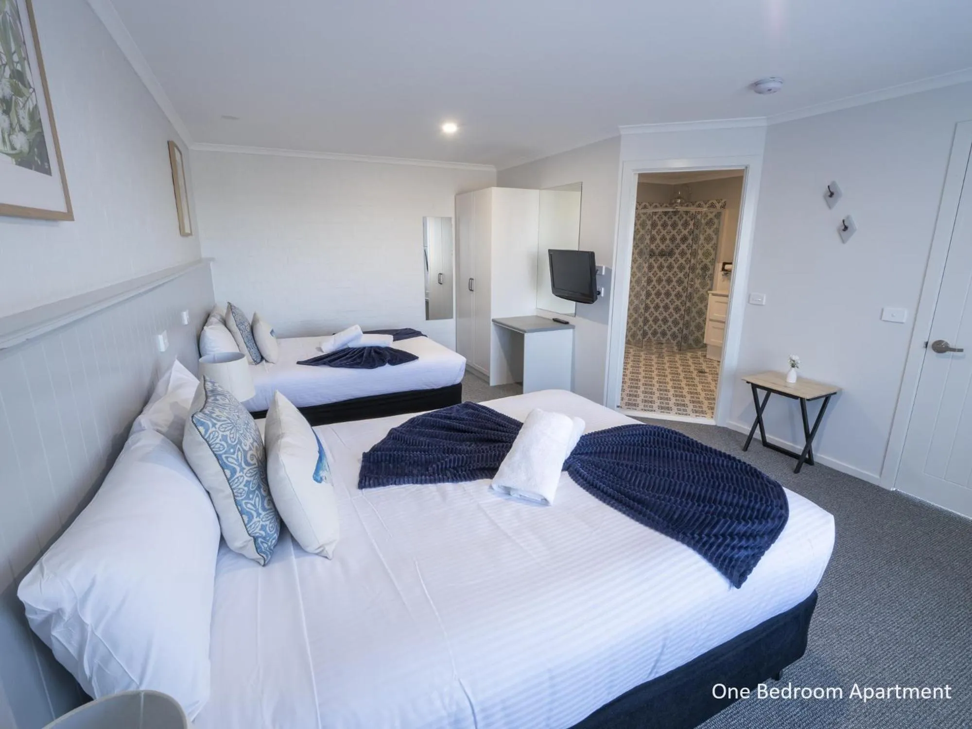 Bed in Heritage House Motel & Units