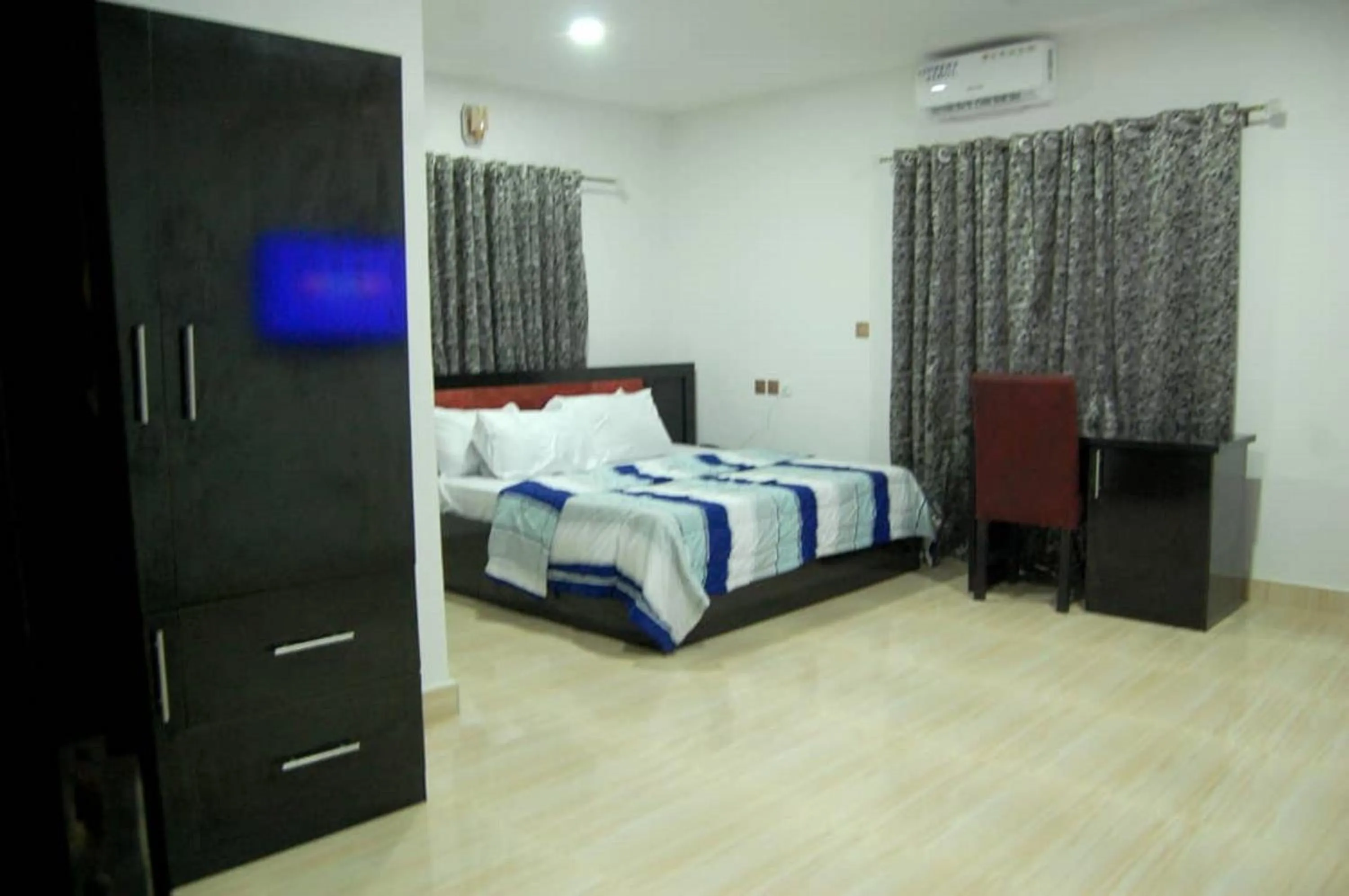 Bed in STARSAPPHIRE LUXURY HOTELS LTD