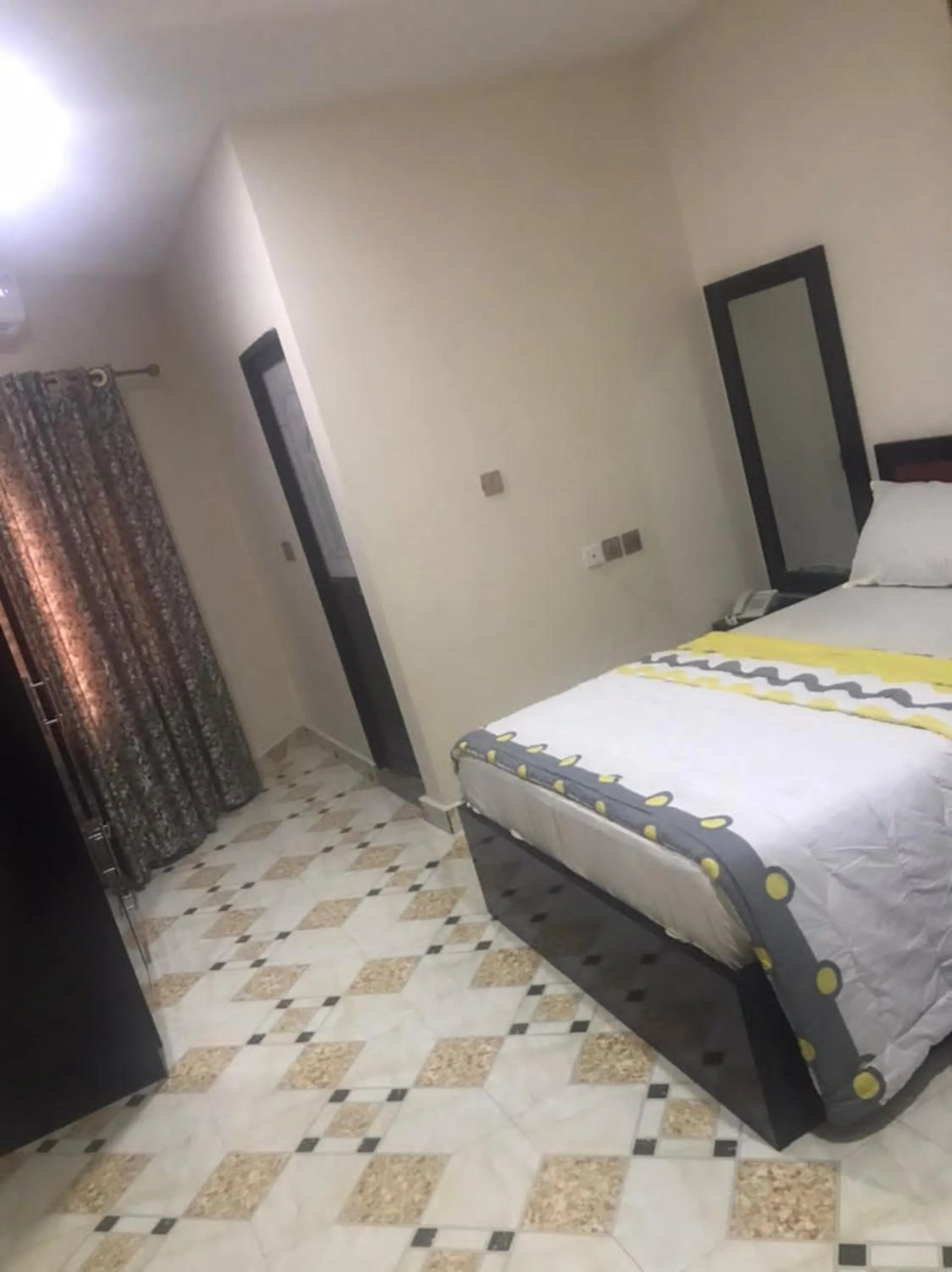 Bed in STARSAPPHIRE LUXURY HOTELS LTD