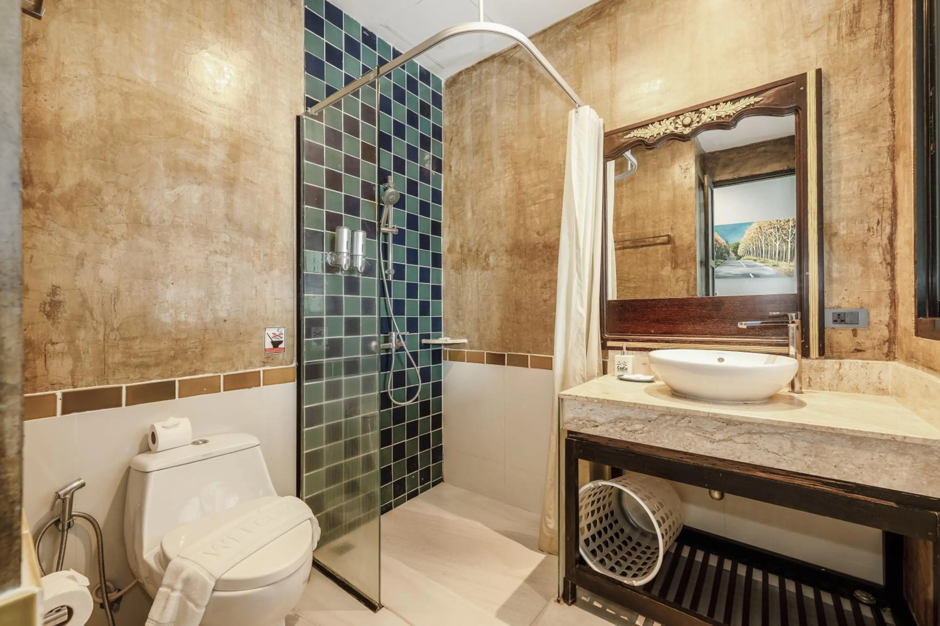 Bathroom in Coco Retreat Phuket Resort and Spa - SHA Plus