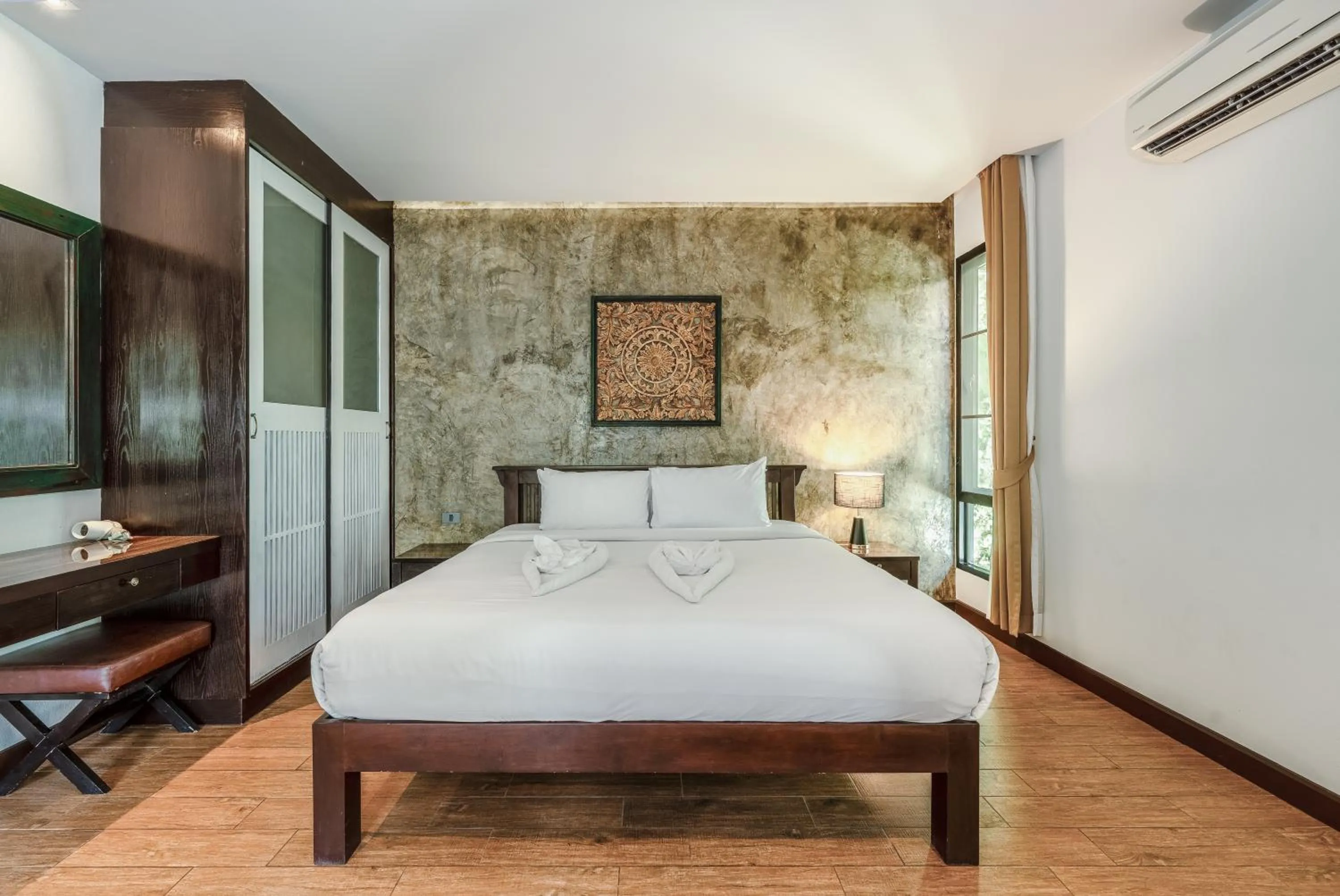 Bed in Coco Retreat Phuket Resort and Spa - SHA Plus