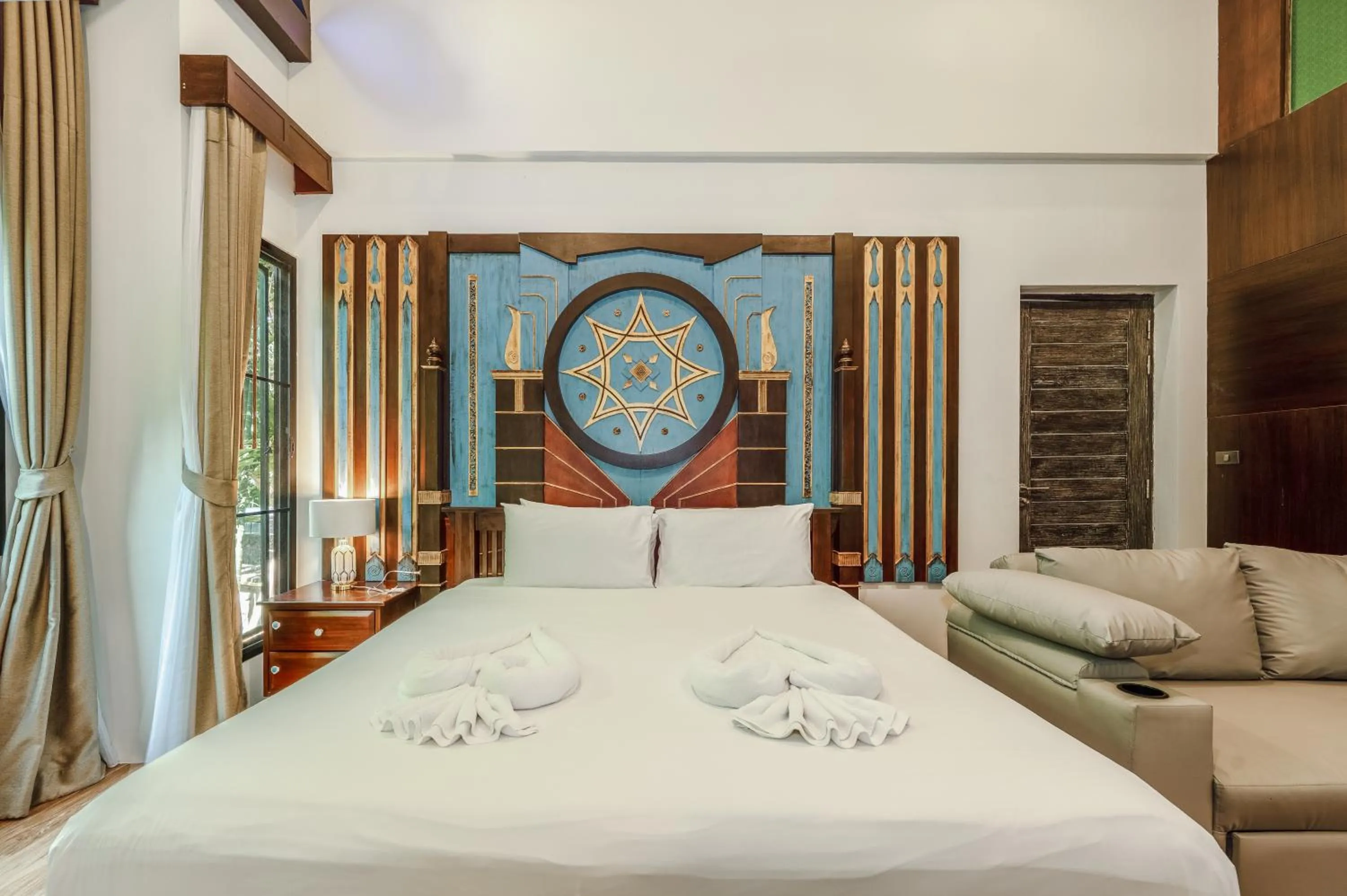 Bed in Coco Retreat Phuket Resort and Spa - SHA Plus