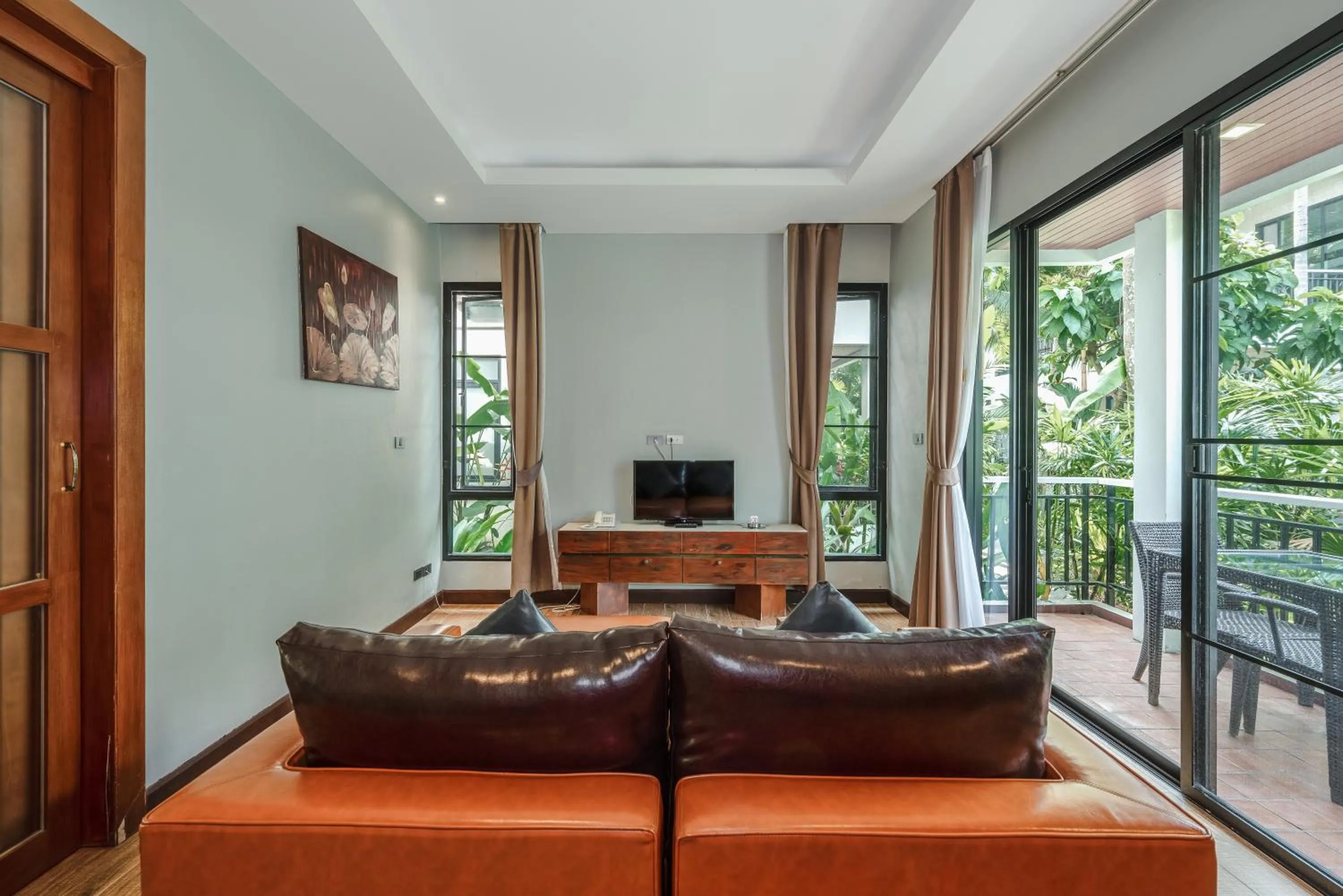 Living room in Coco Retreat Phuket Resort and Spa - SHA Plus