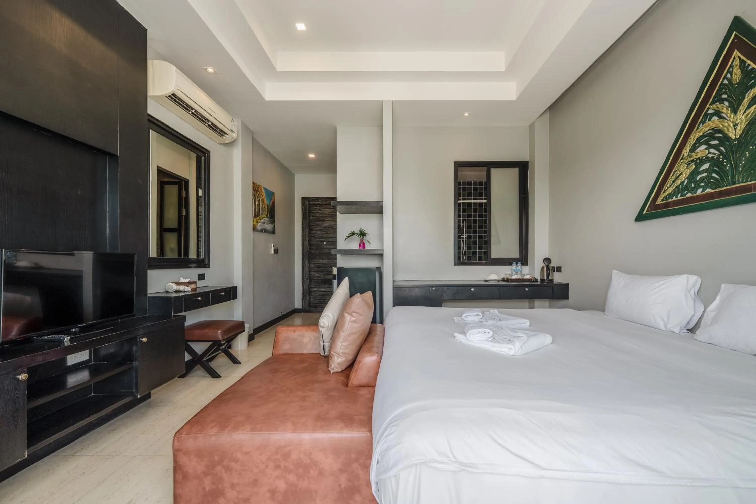 Bed in Coco Retreat Phuket Resort and Spa - SHA Plus