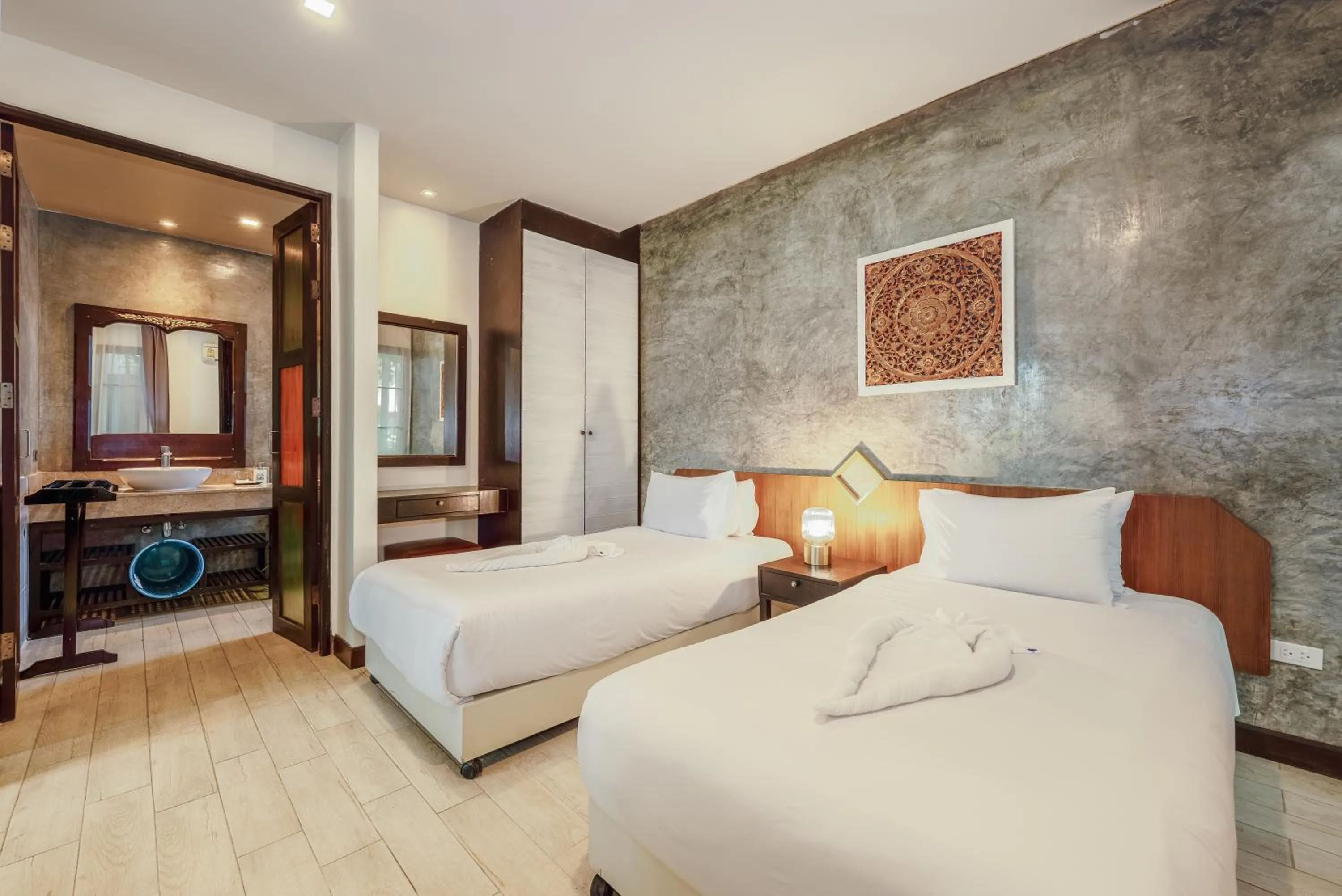 Bed in Coco Retreat Phuket Resort and Spa - SHA Plus