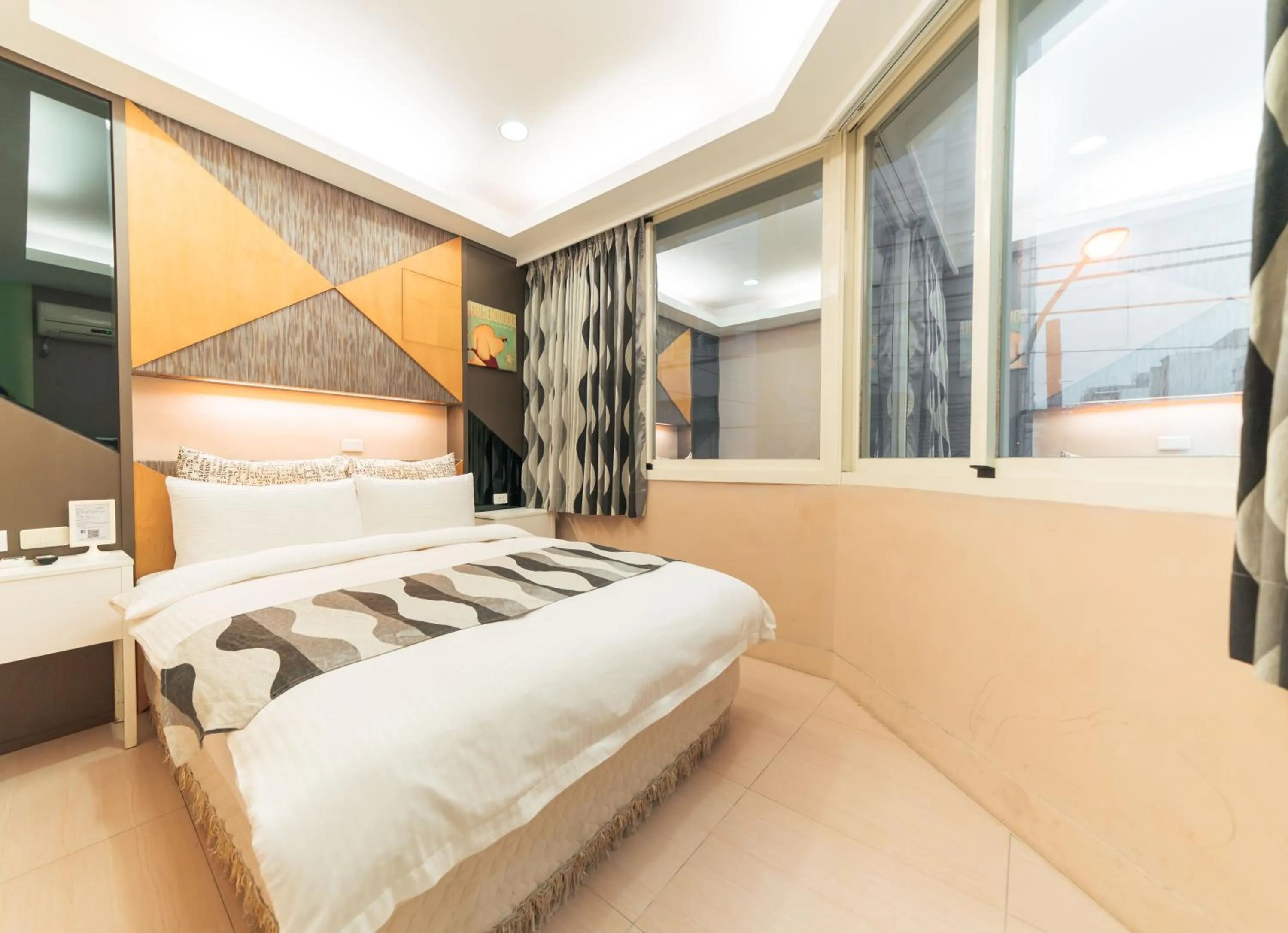 Photo of the whole room, Bed in Story Inn City