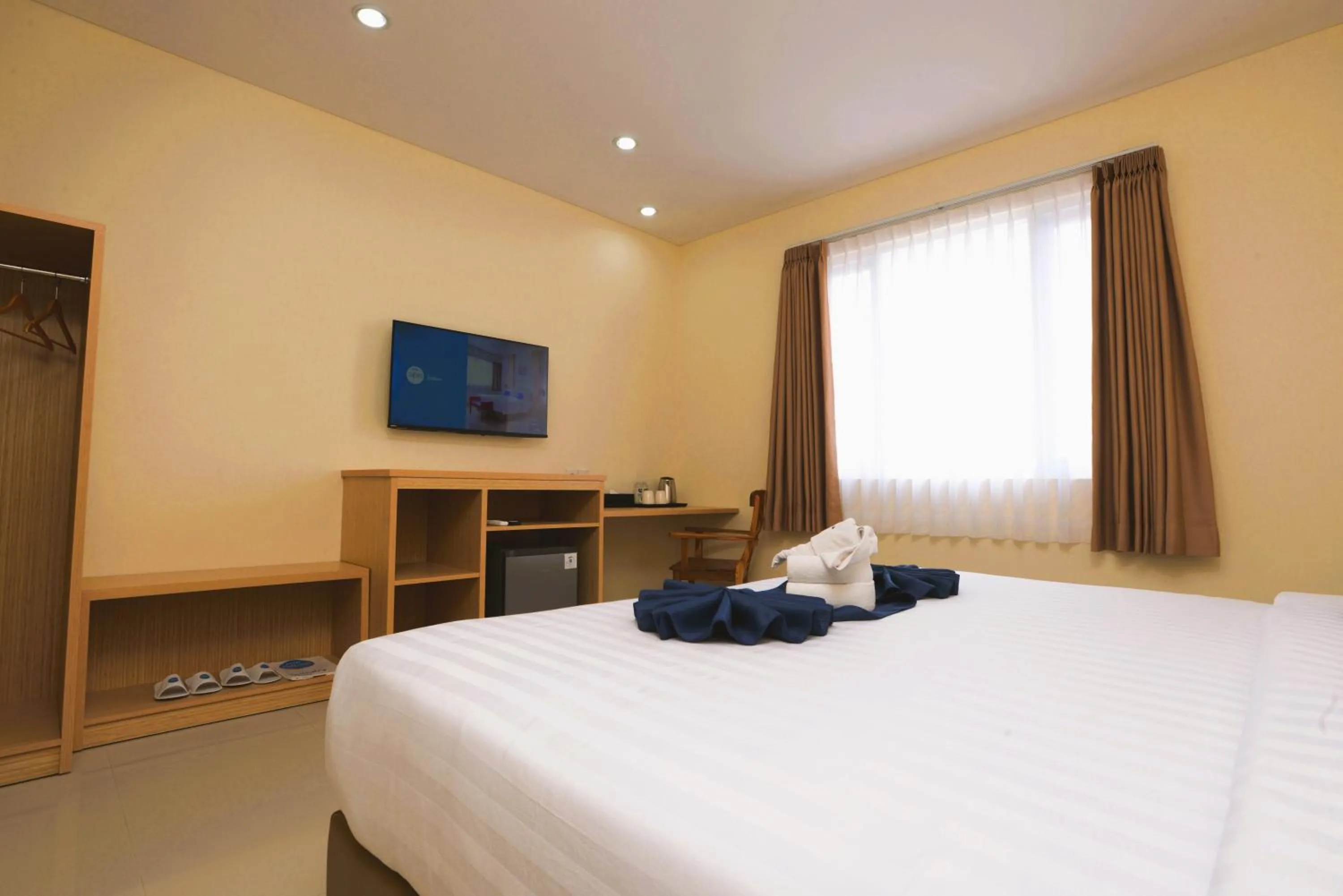 Bed in Hotel Dafam Rio