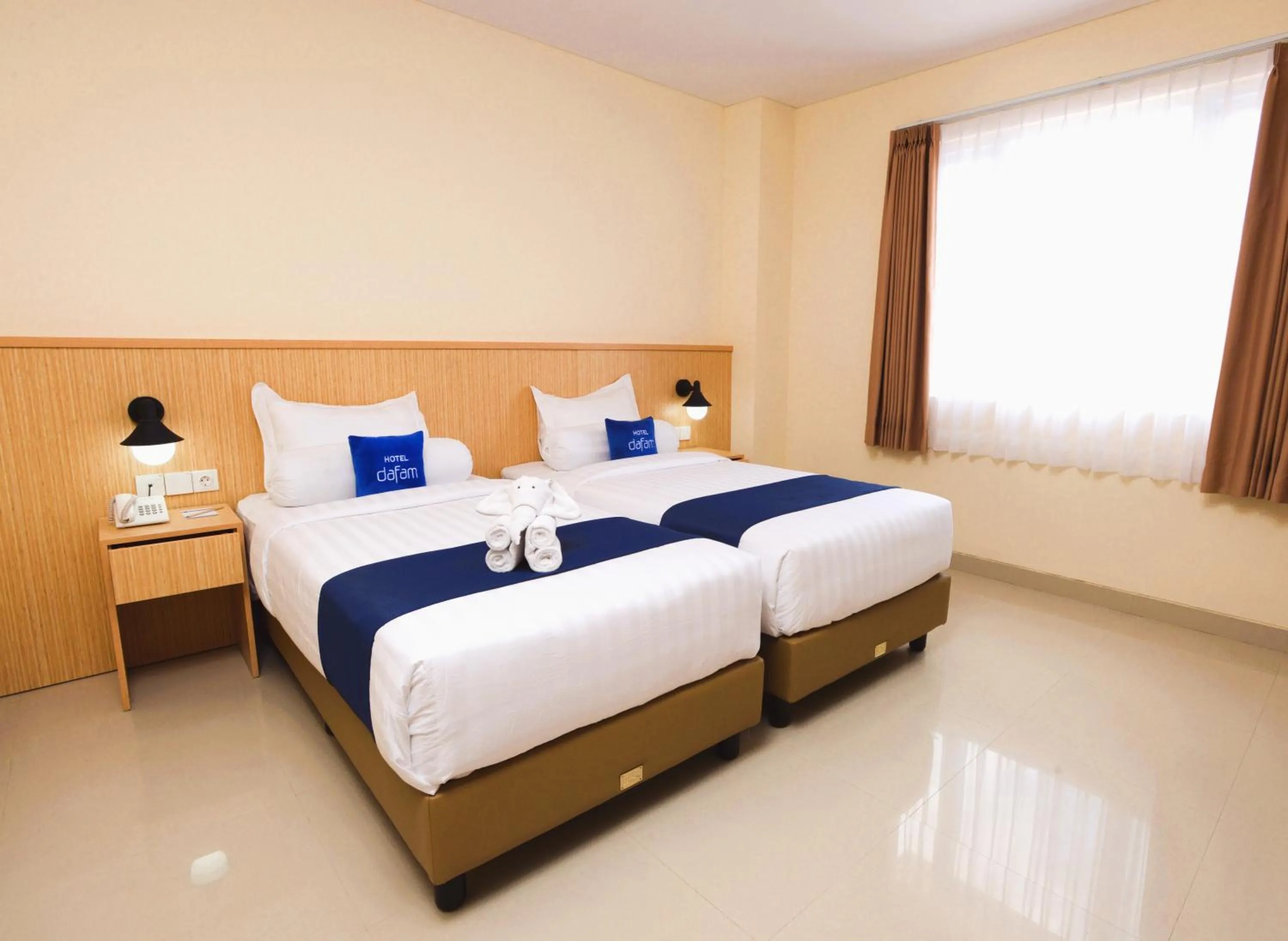 Photo of the whole room, Bed in Hotel Dafam Rio