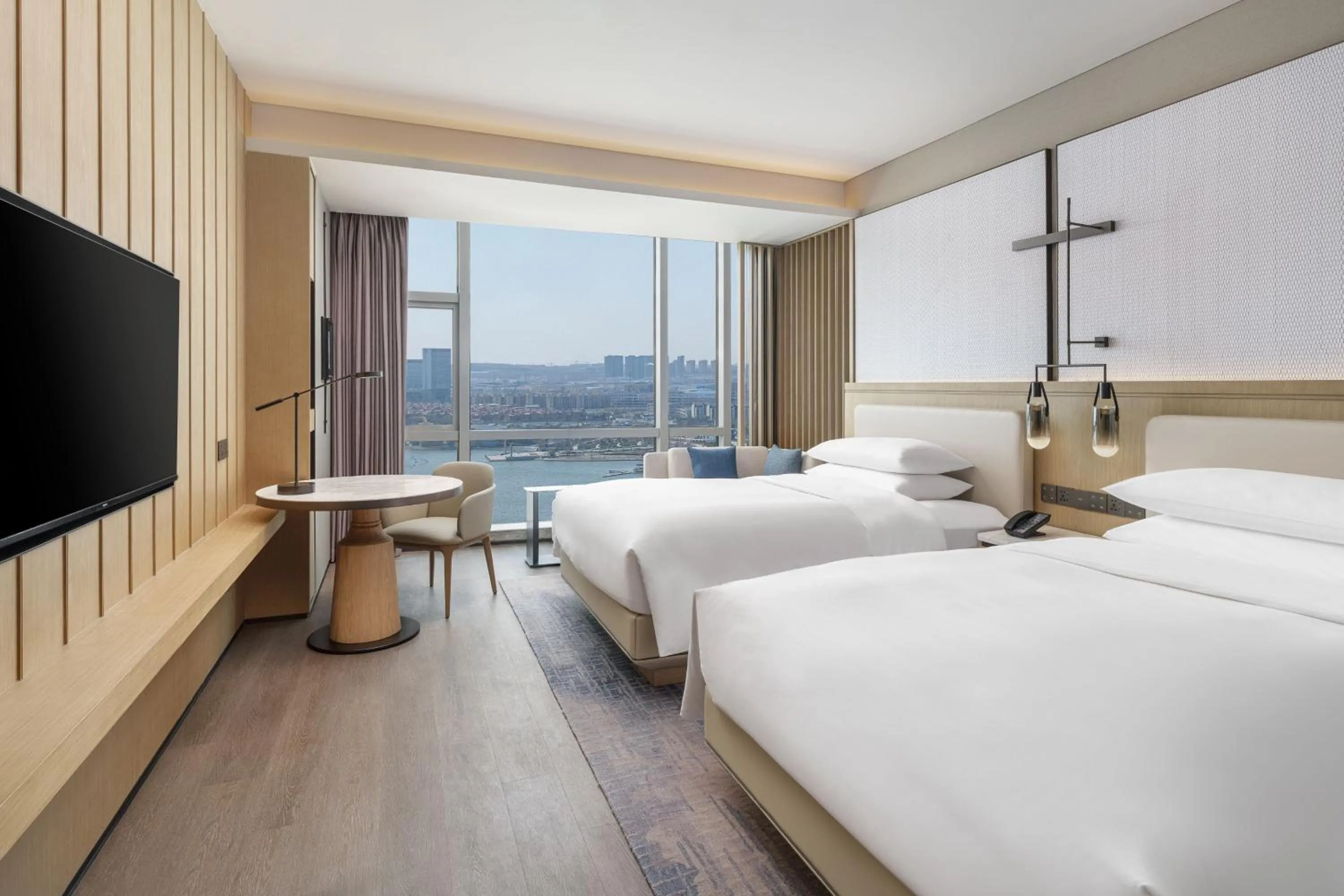 Photo of the whole room, Bed in Qingdao Marriott Hotel Jiaozhou