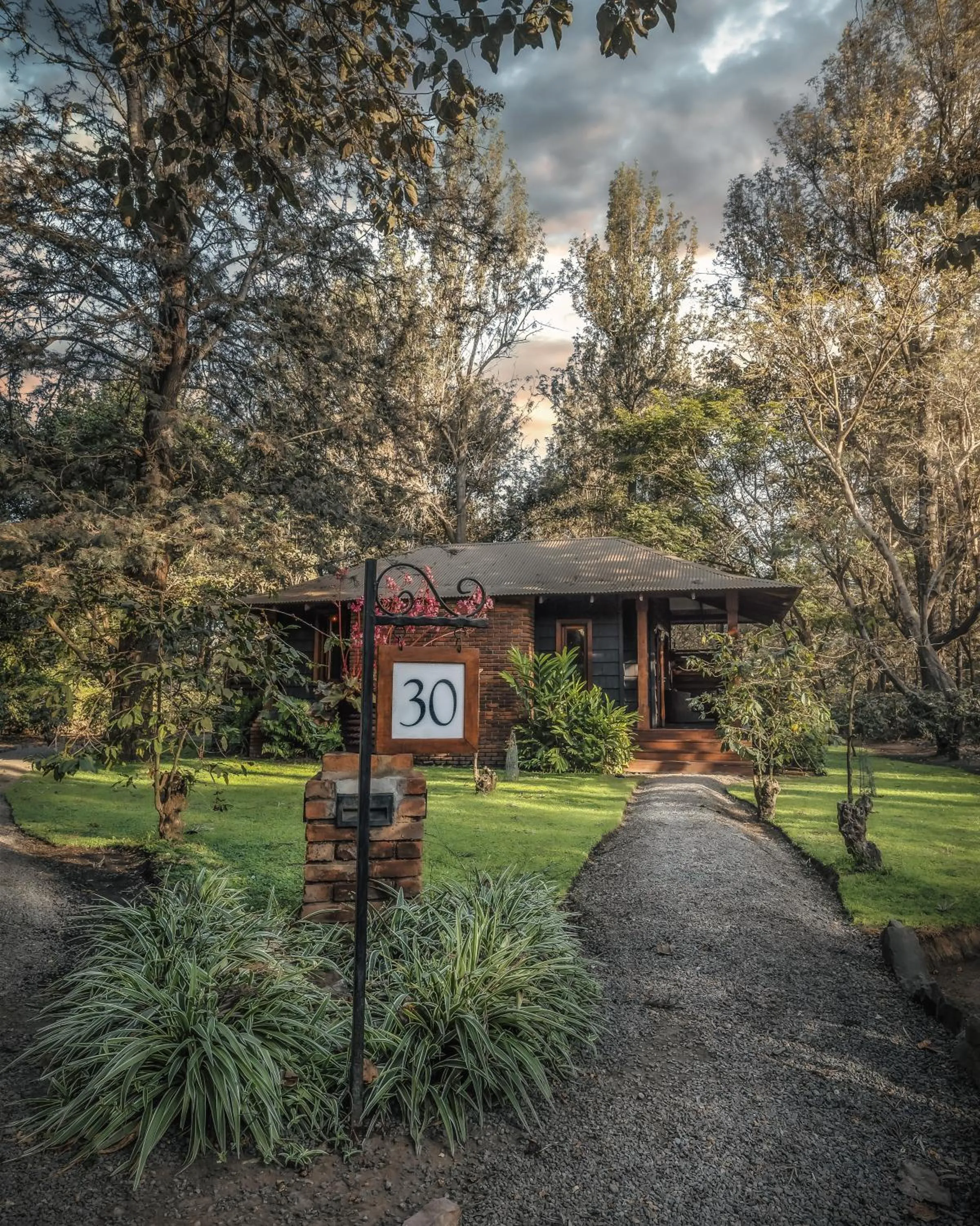 Bedroom in Elewana Arusha Coffee Lodge