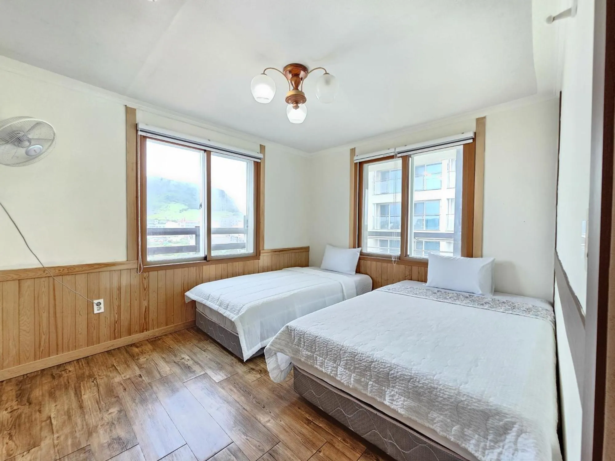 Bed in Seongsan Sunrise Pension