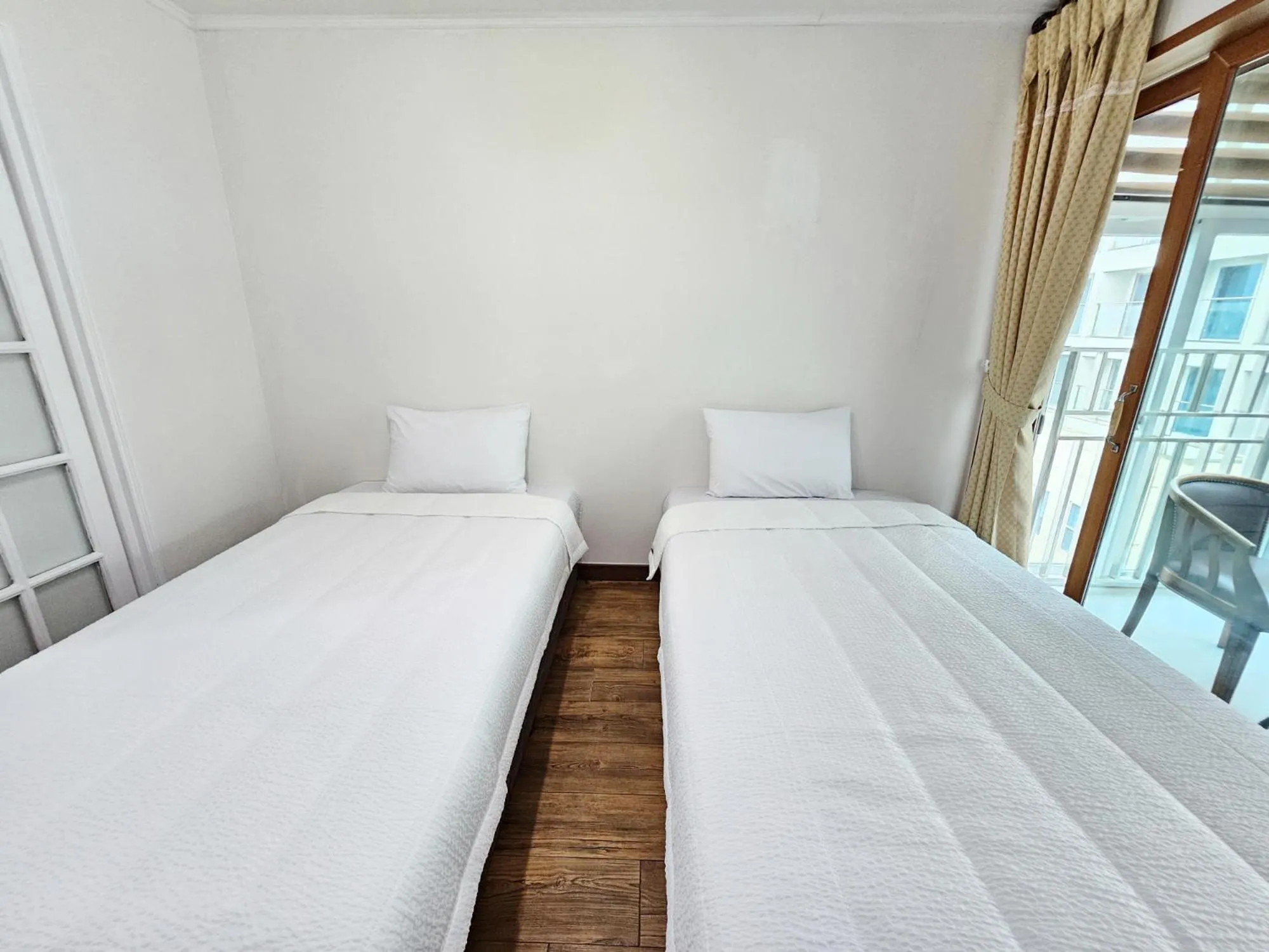 Bed in Seongsan Sunrise Pension