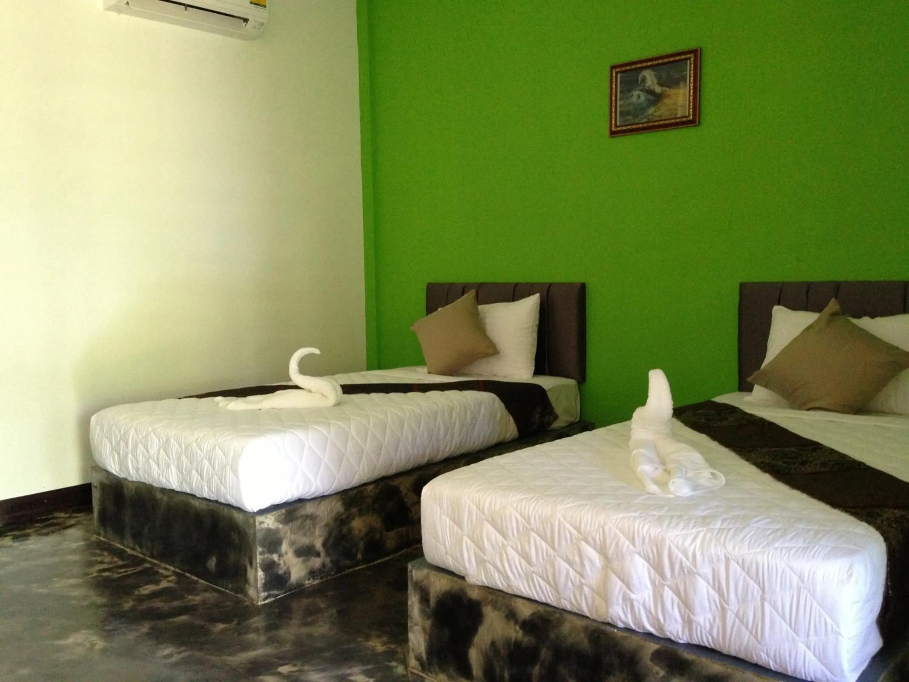 Bed in Baan Rai Phufah Resort Chiangrai