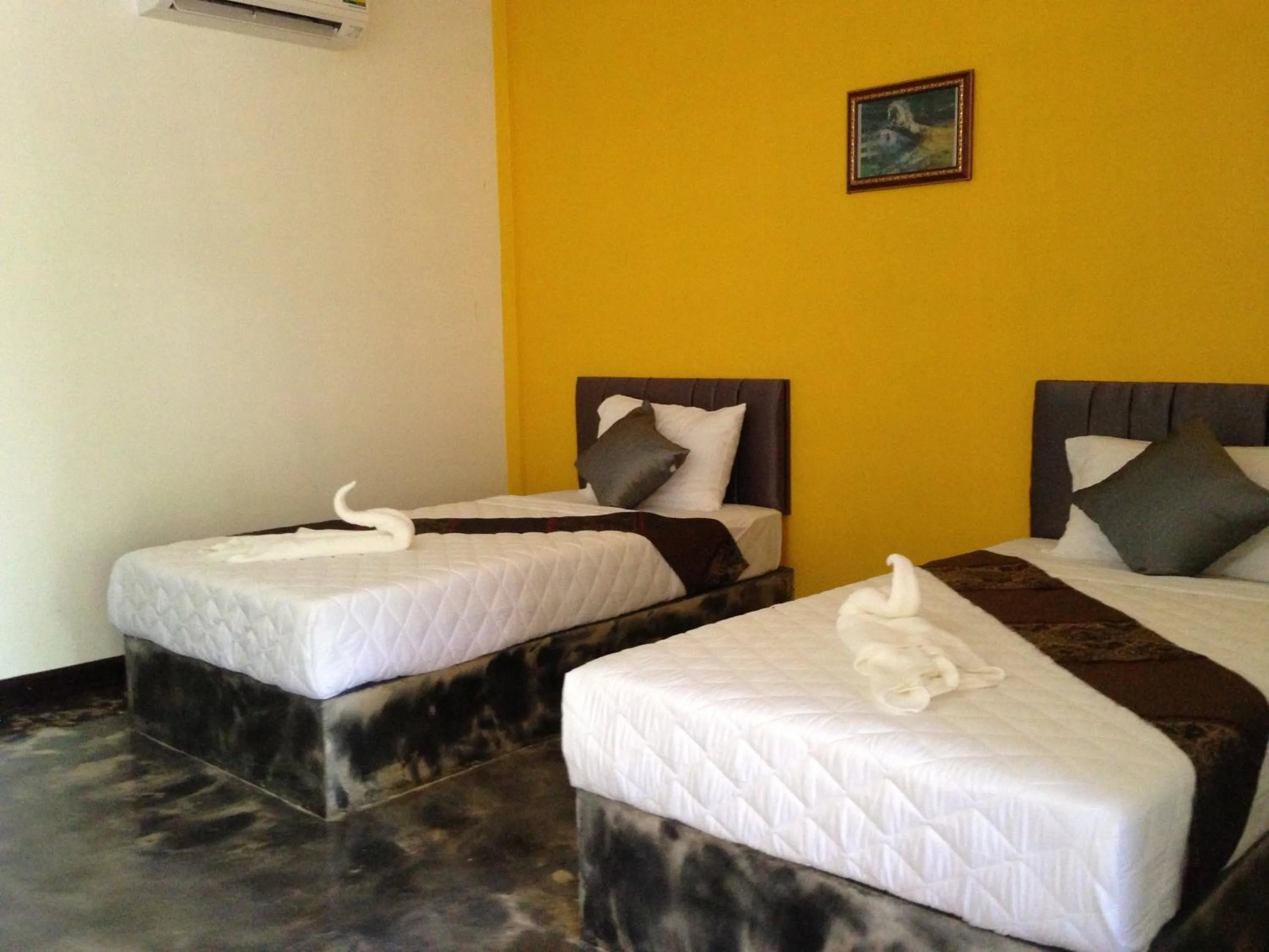 Bed in Baan Rai Phufah Resort Chiangrai