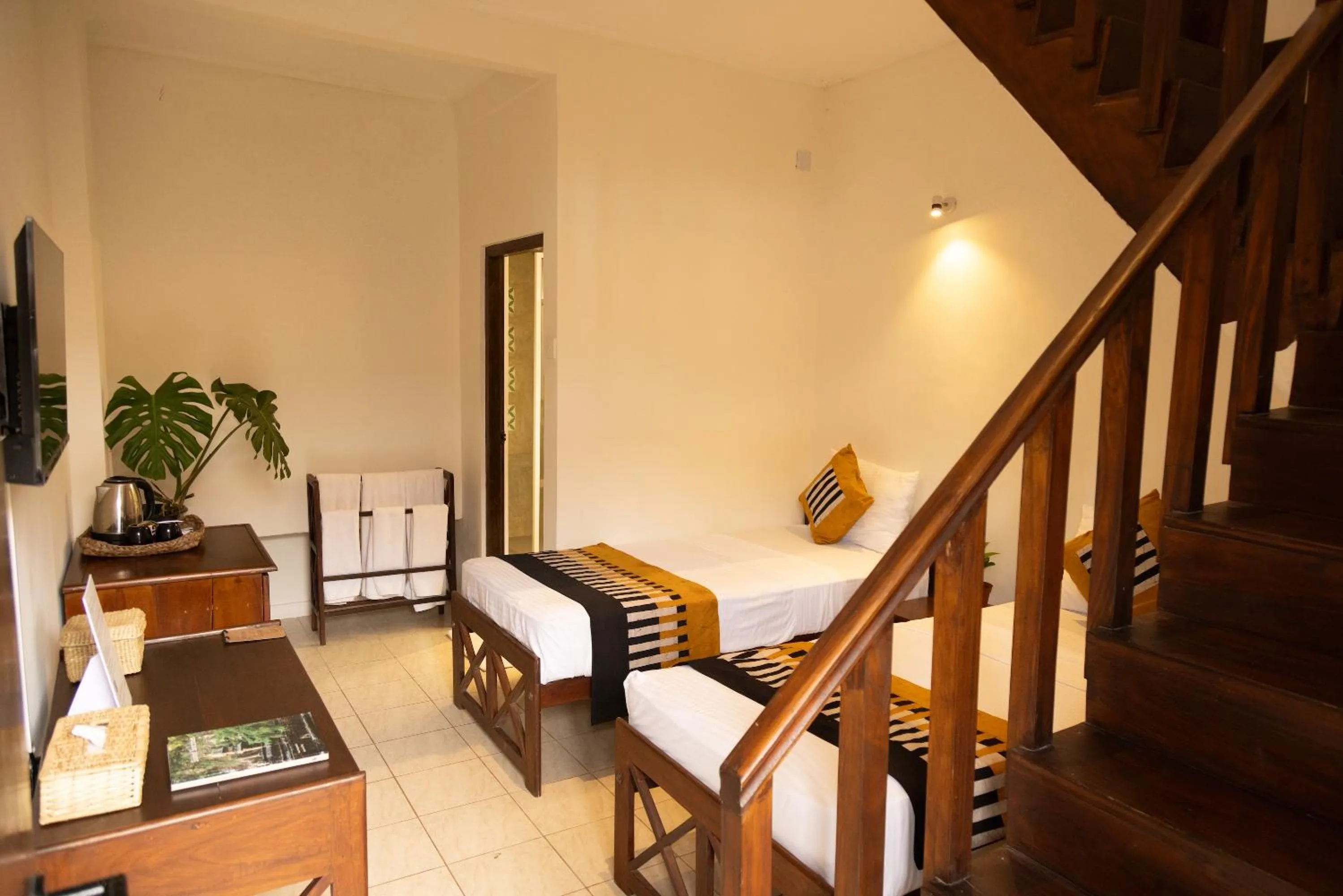 Bed in Neevana Hotel Hikkaduwa