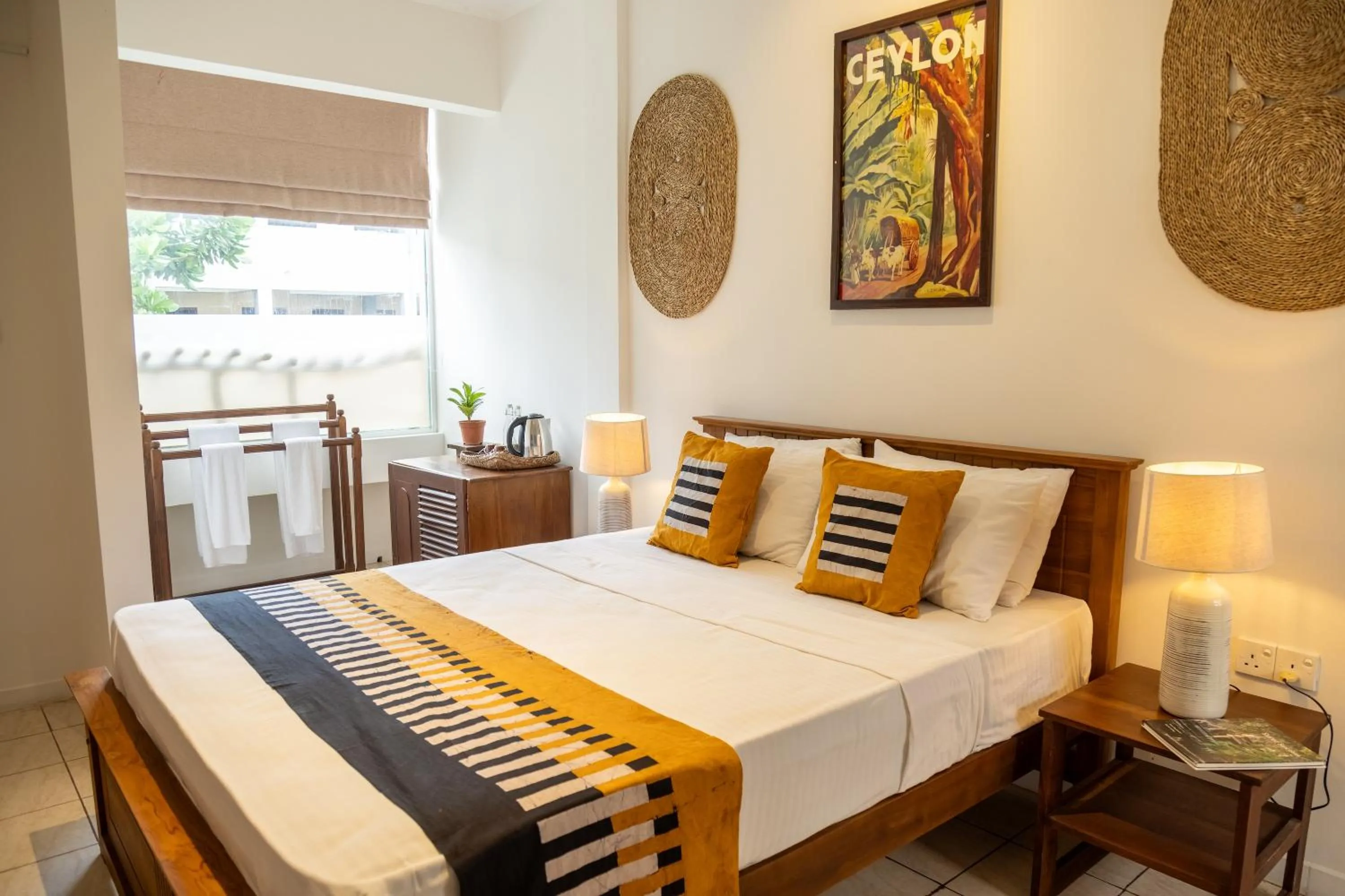 Bed in Neevana Hotel Hikkaduwa