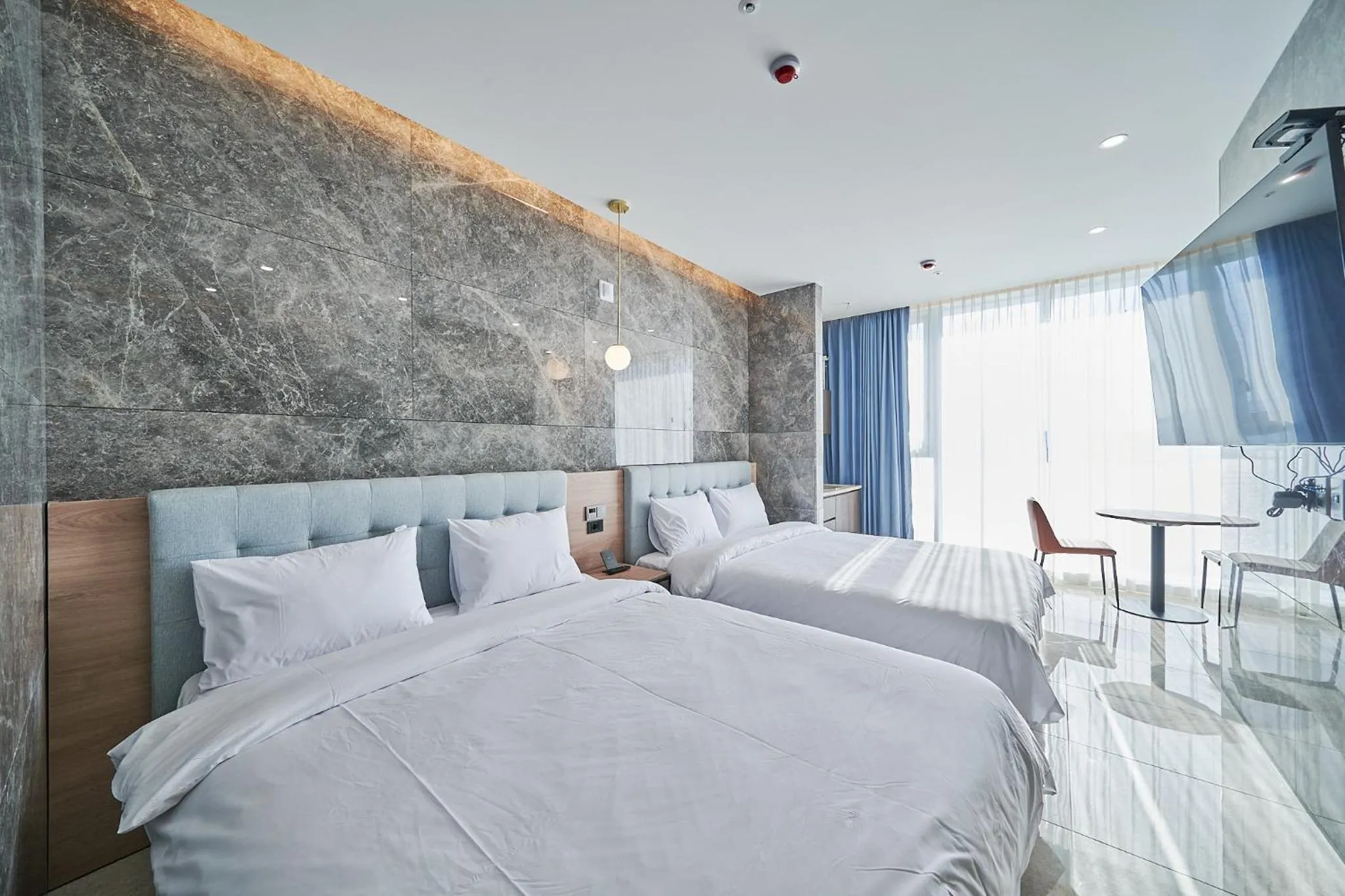 Bed in Yeosu Calacatta Hotel & Resort