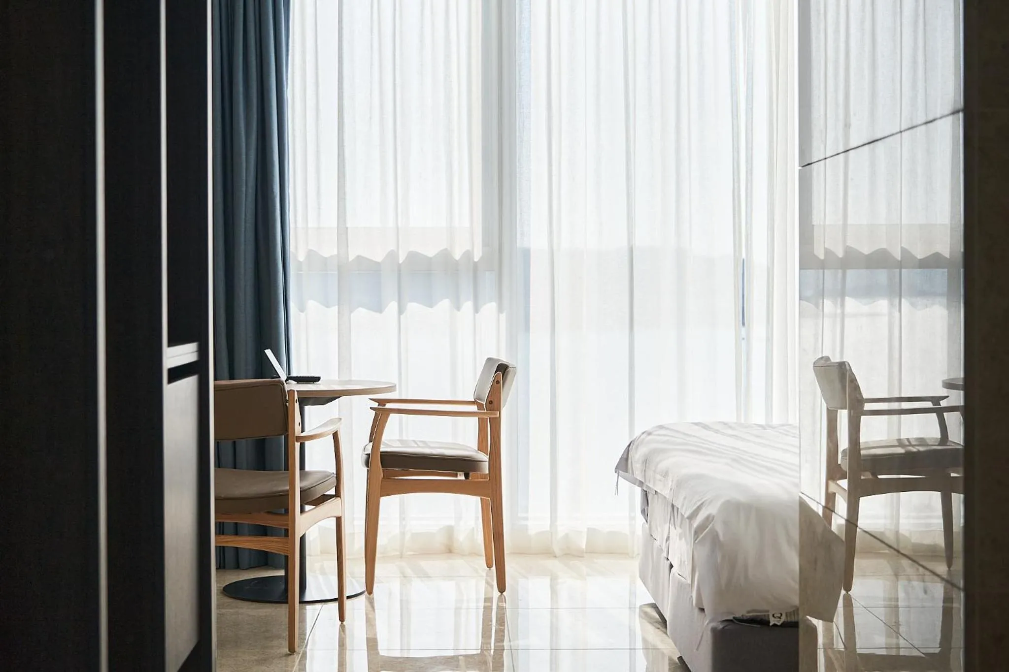 Bed in Yeosu Calacatta Hotel & Resort