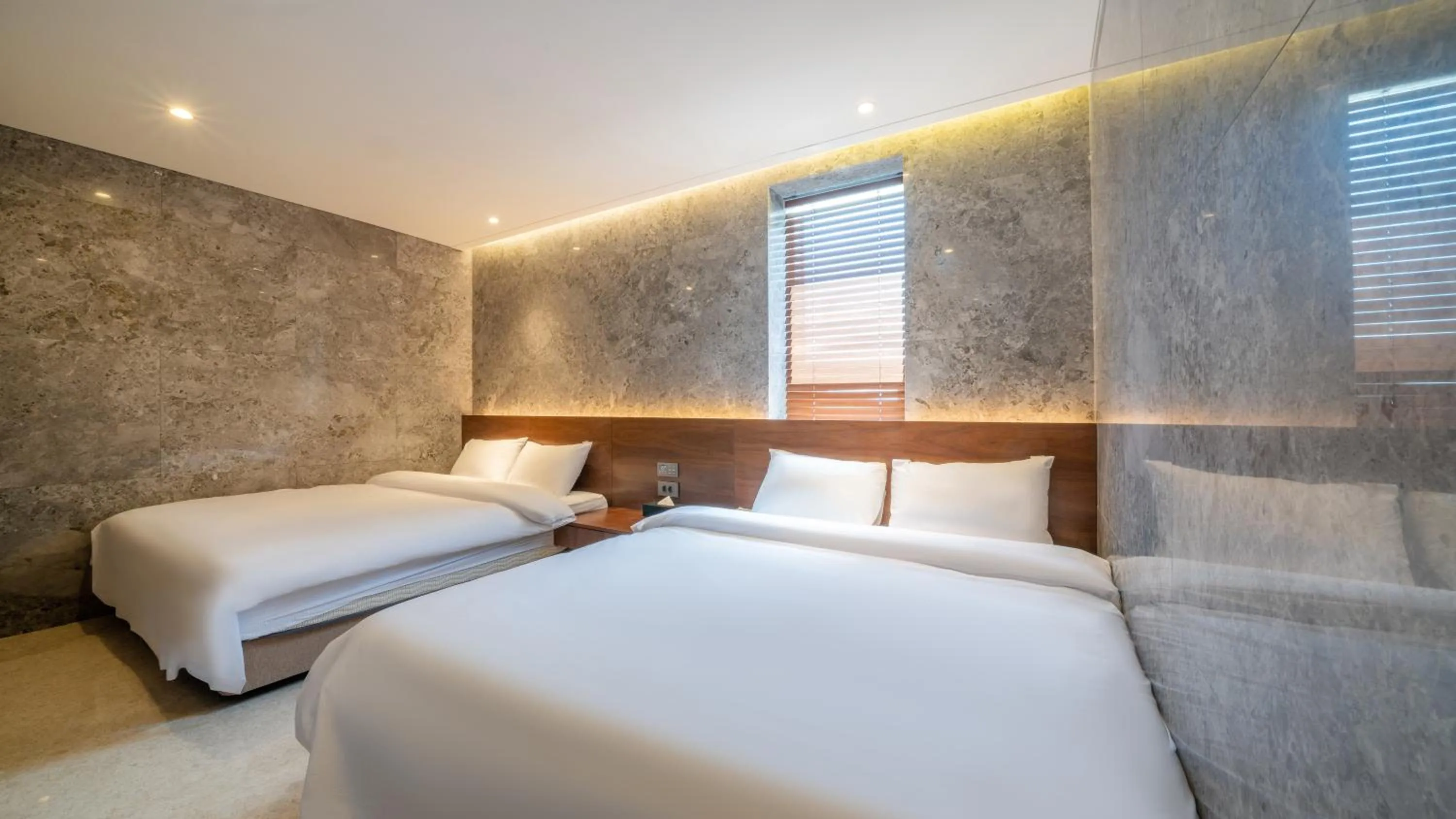 Bed in Yeosu Calacatta Hotel & Resort