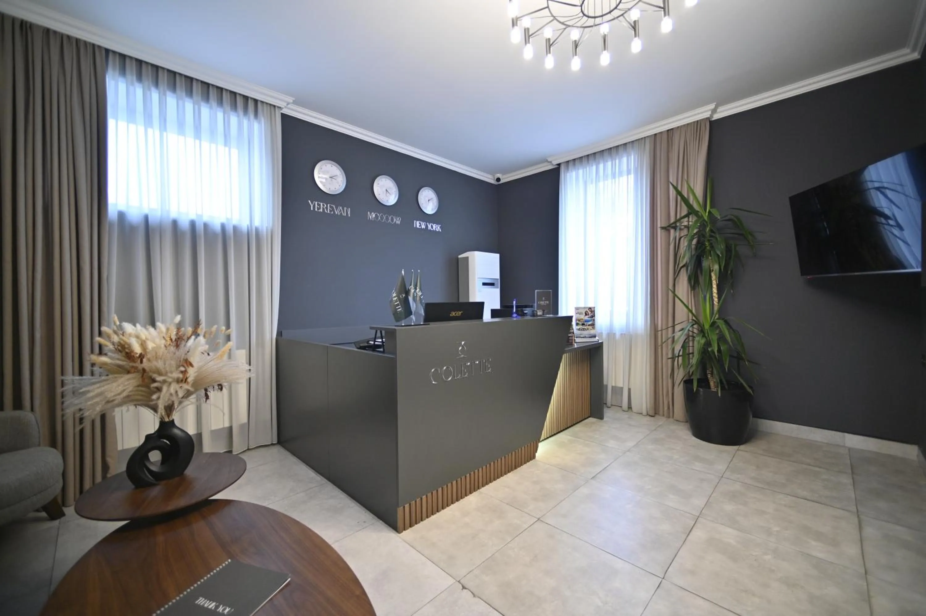 Communal lounge/ TV room in Colette Hotel