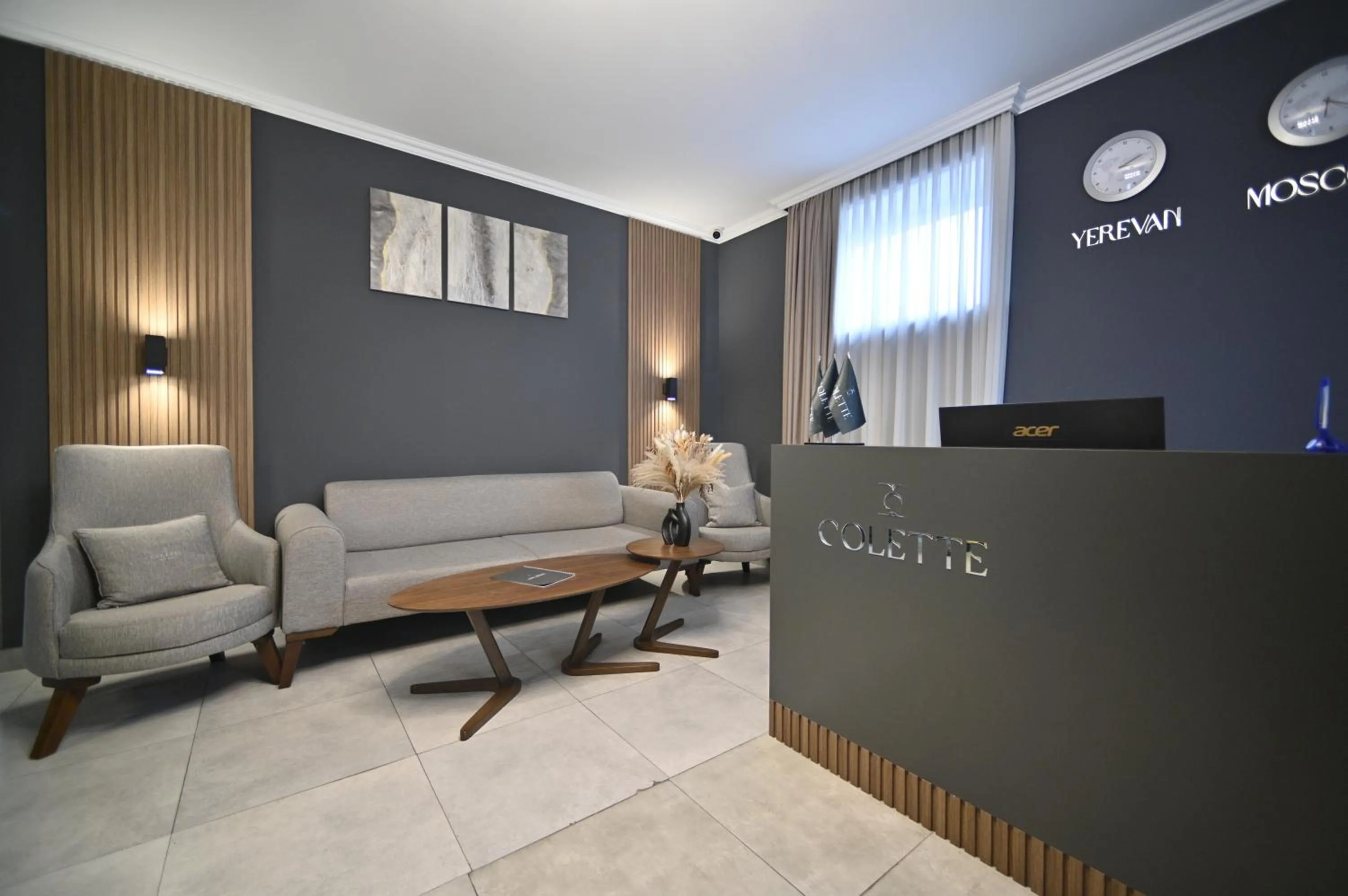 Communal lounge/ TV room in Colette Hotel