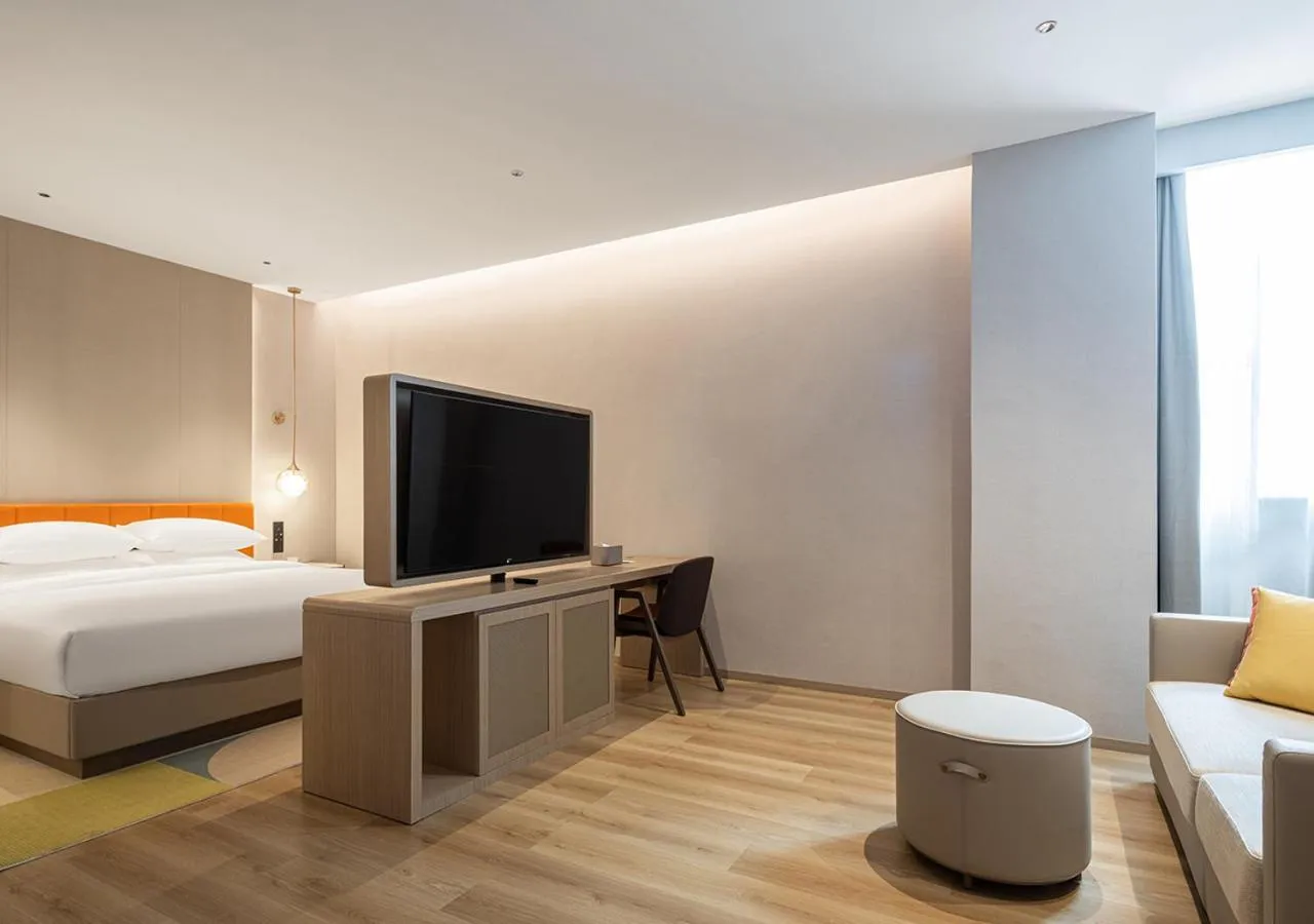 Living room, Bed in Home2 Suite by Hilton Chongqing South Bank