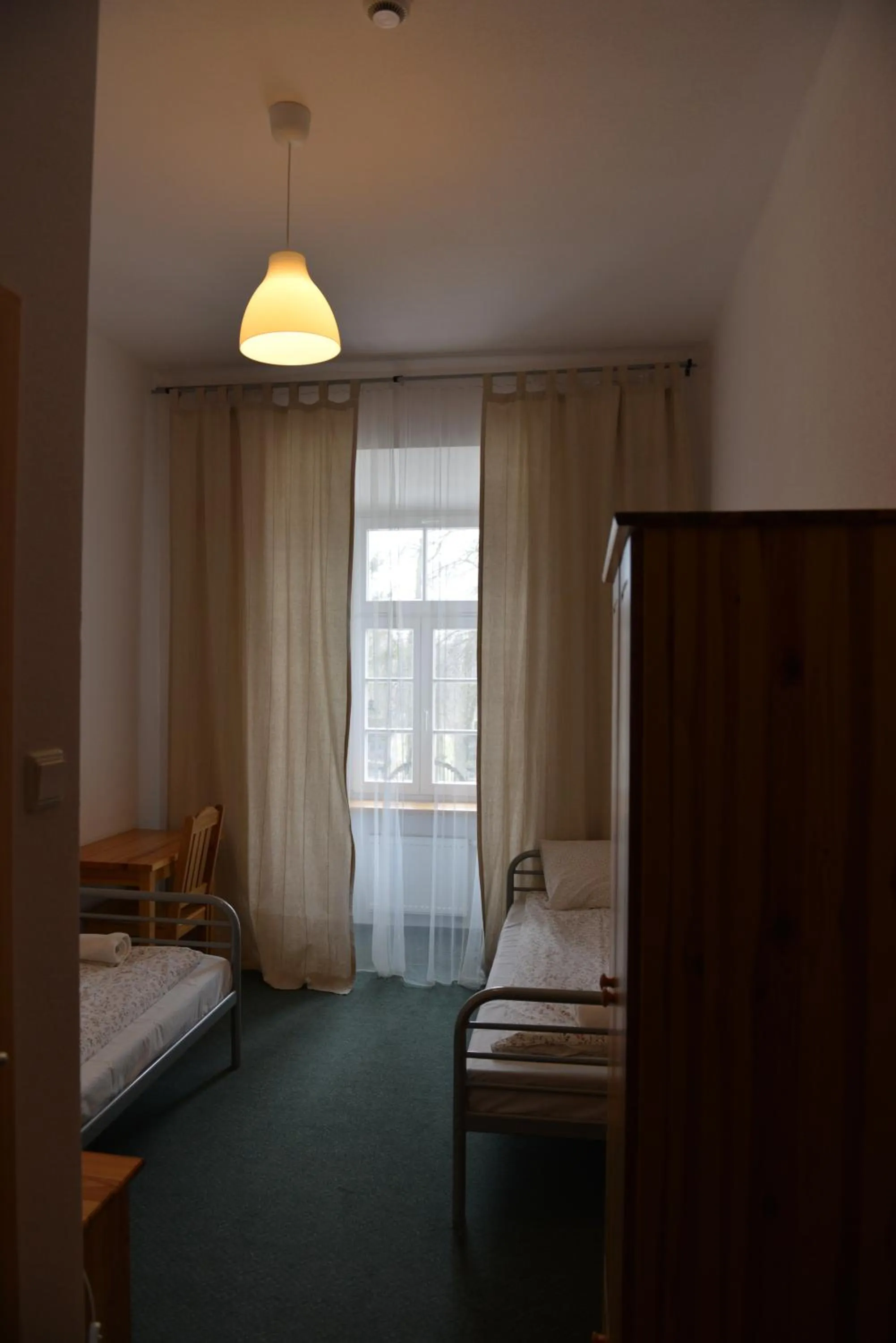 Photo of the whole room, Bed in Pokoje Gościnne Domu Pielgrzyma w Supraślu