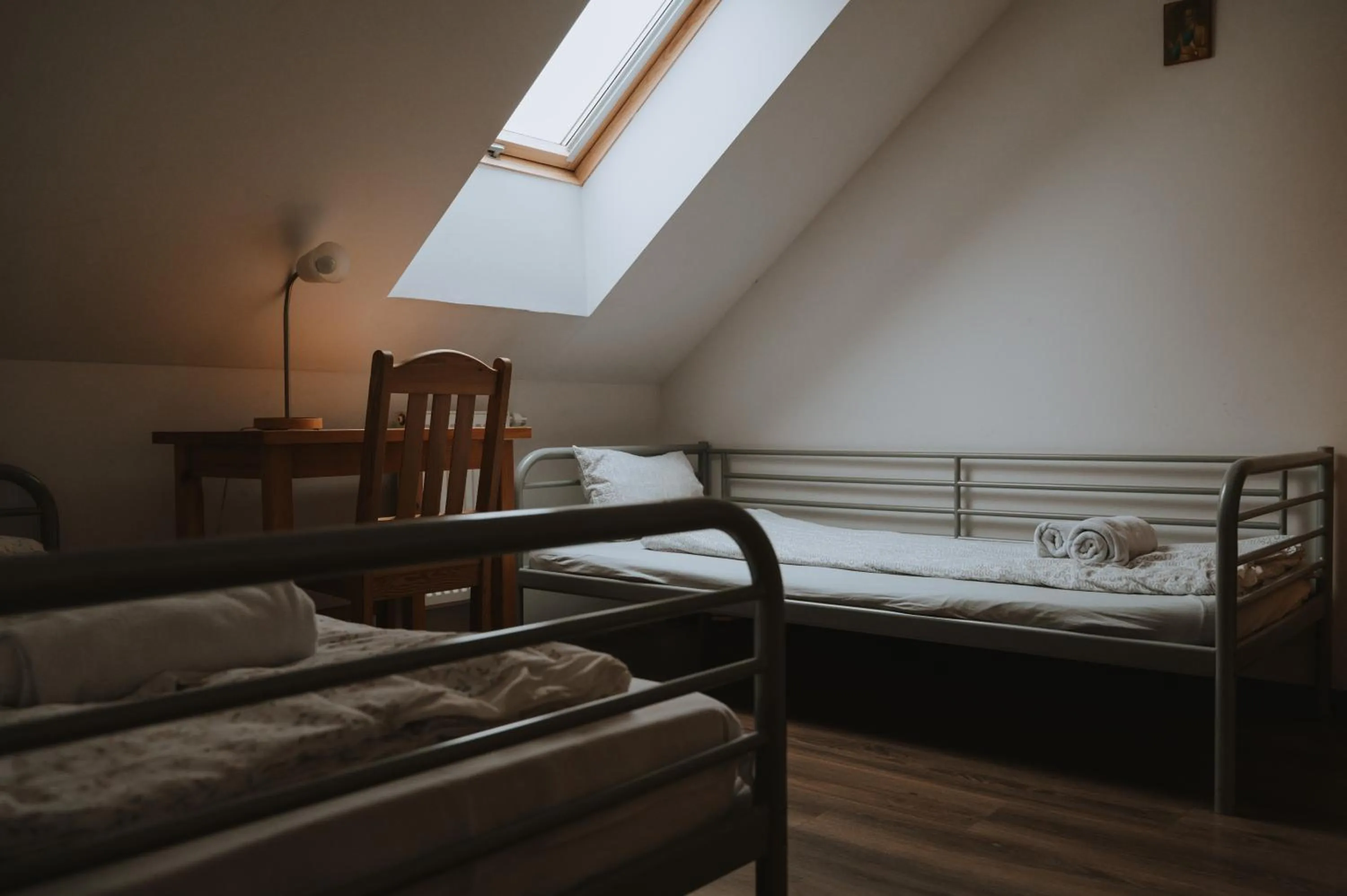 Bed in Pokoje Gościnne Domu Pielgrzyma w Supraślu