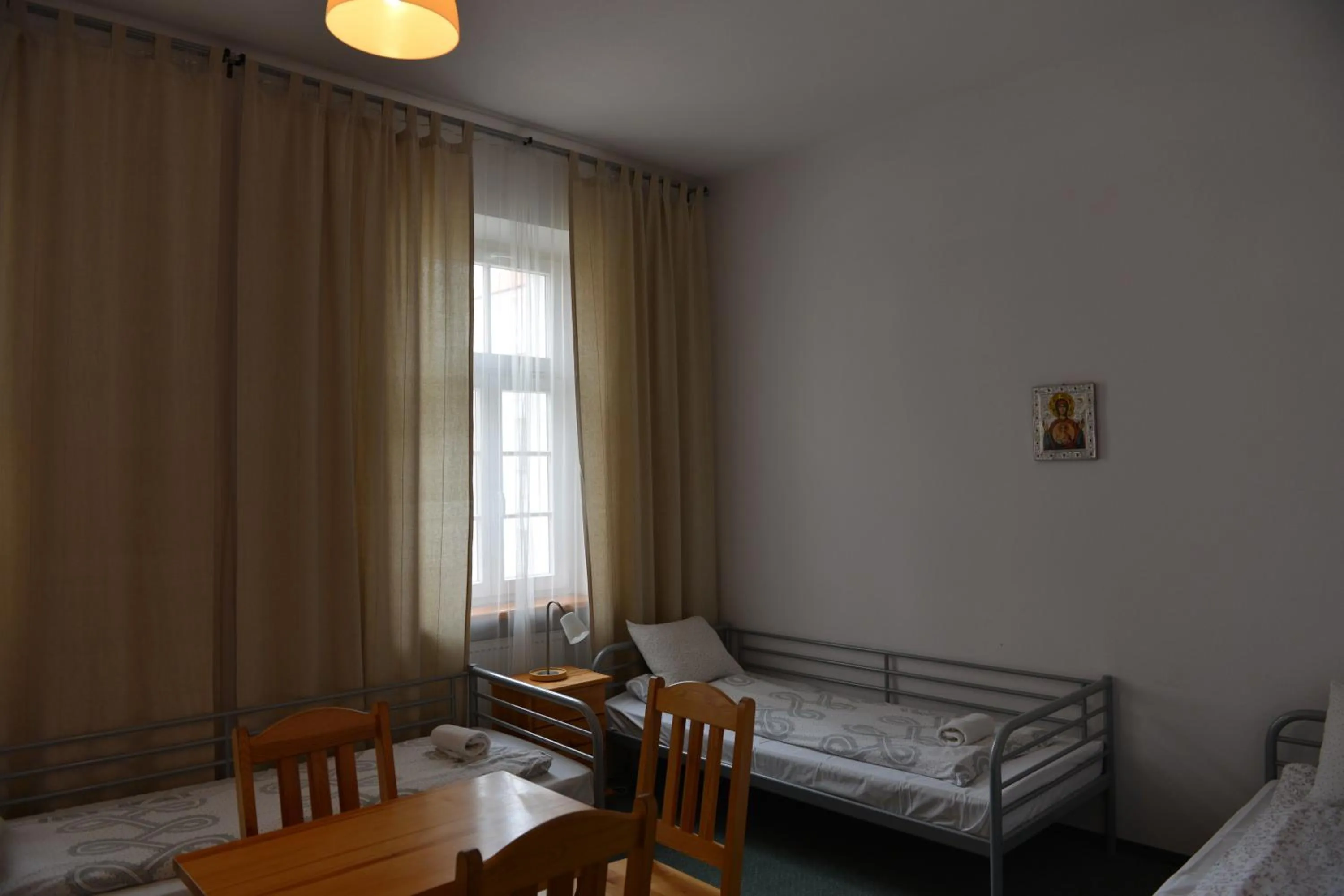 Photo of the whole room, Bed in Pokoje Gościnne Domu Pielgrzyma w Supraślu