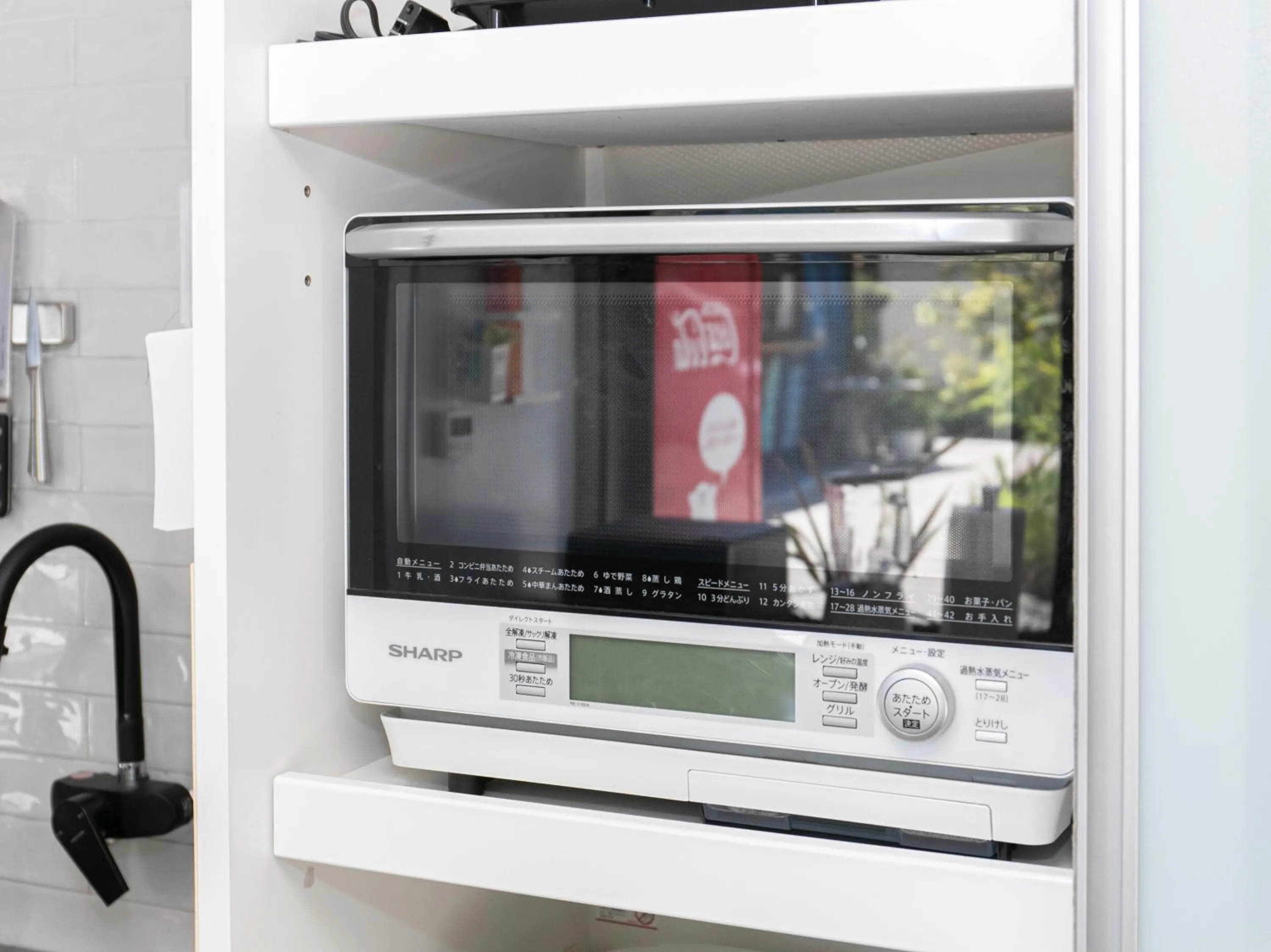 Communal kitchen in Tabist Guest house Pumping Surf