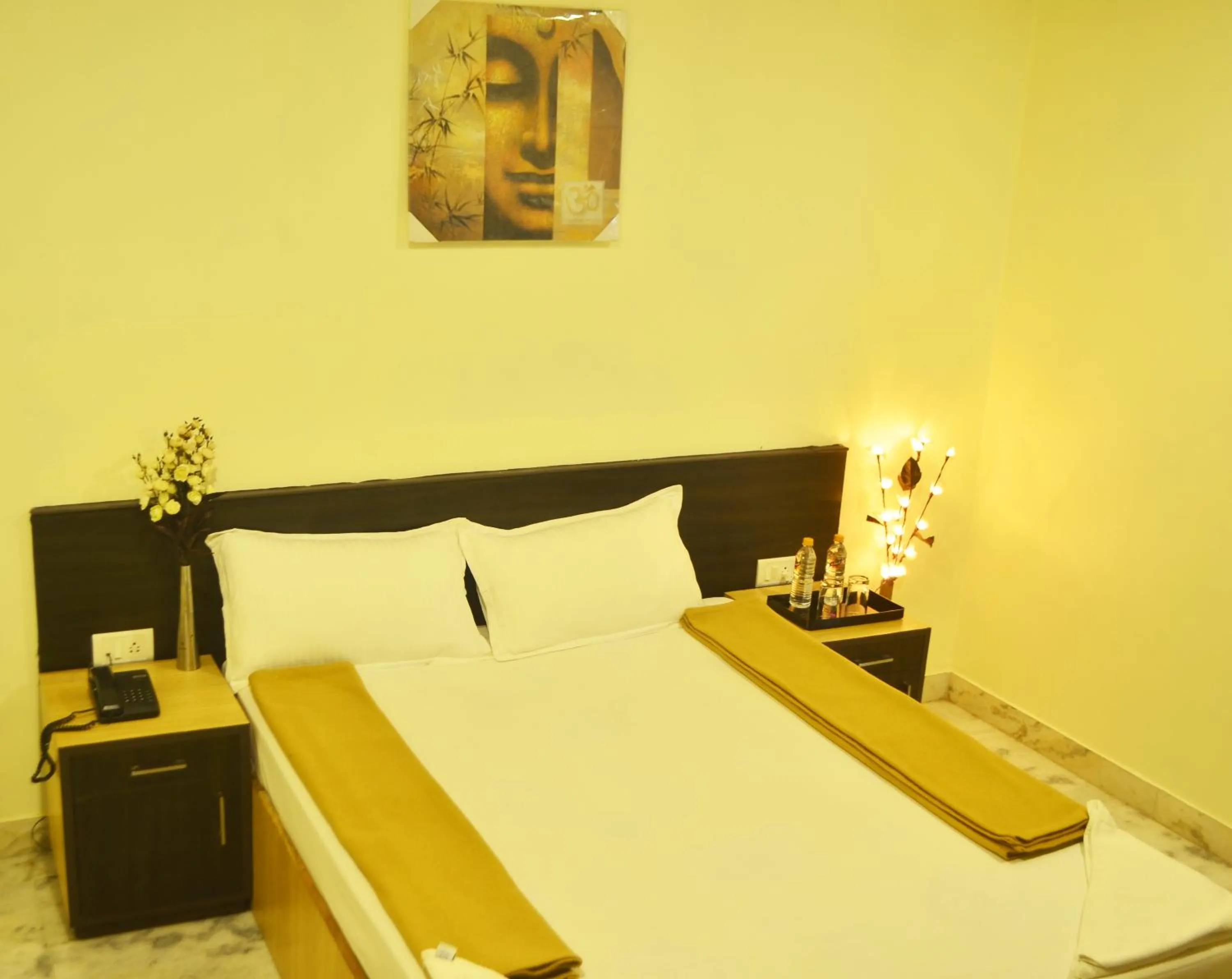 Bed in Hotel Arunachala