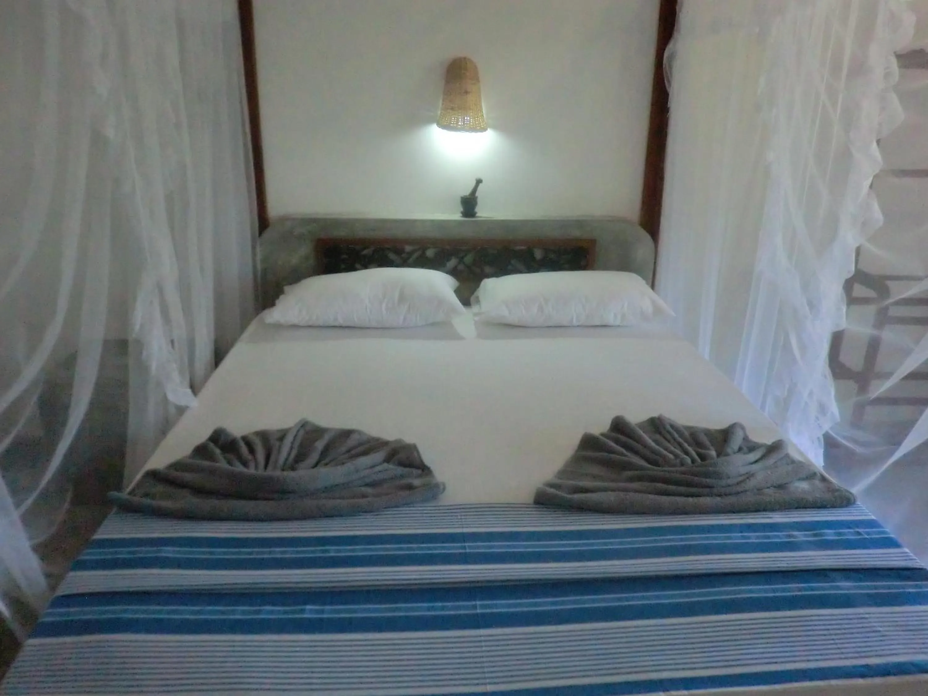 Bed in Peacock Wings Guest