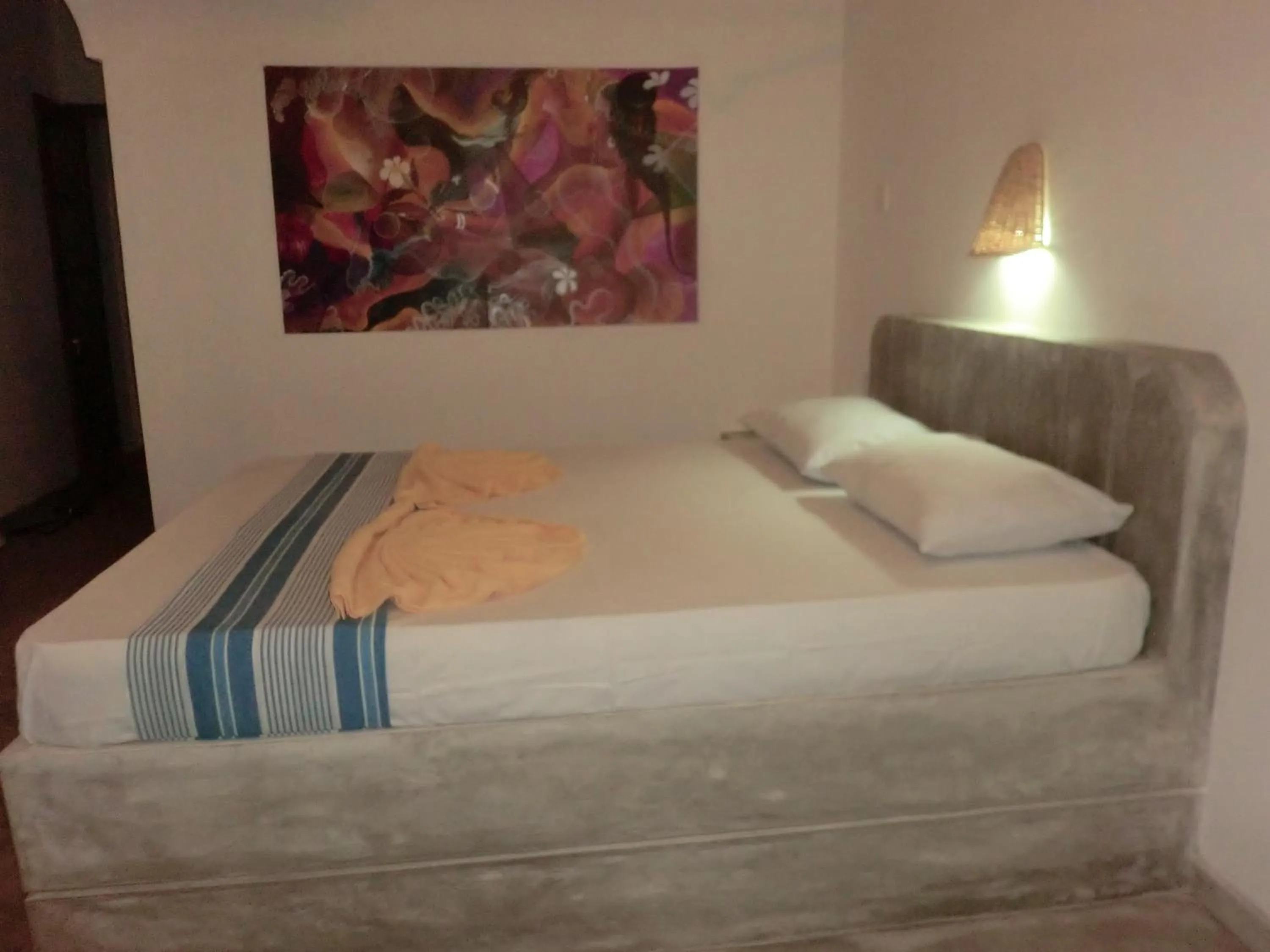 Bed in Peacock Wings Guest