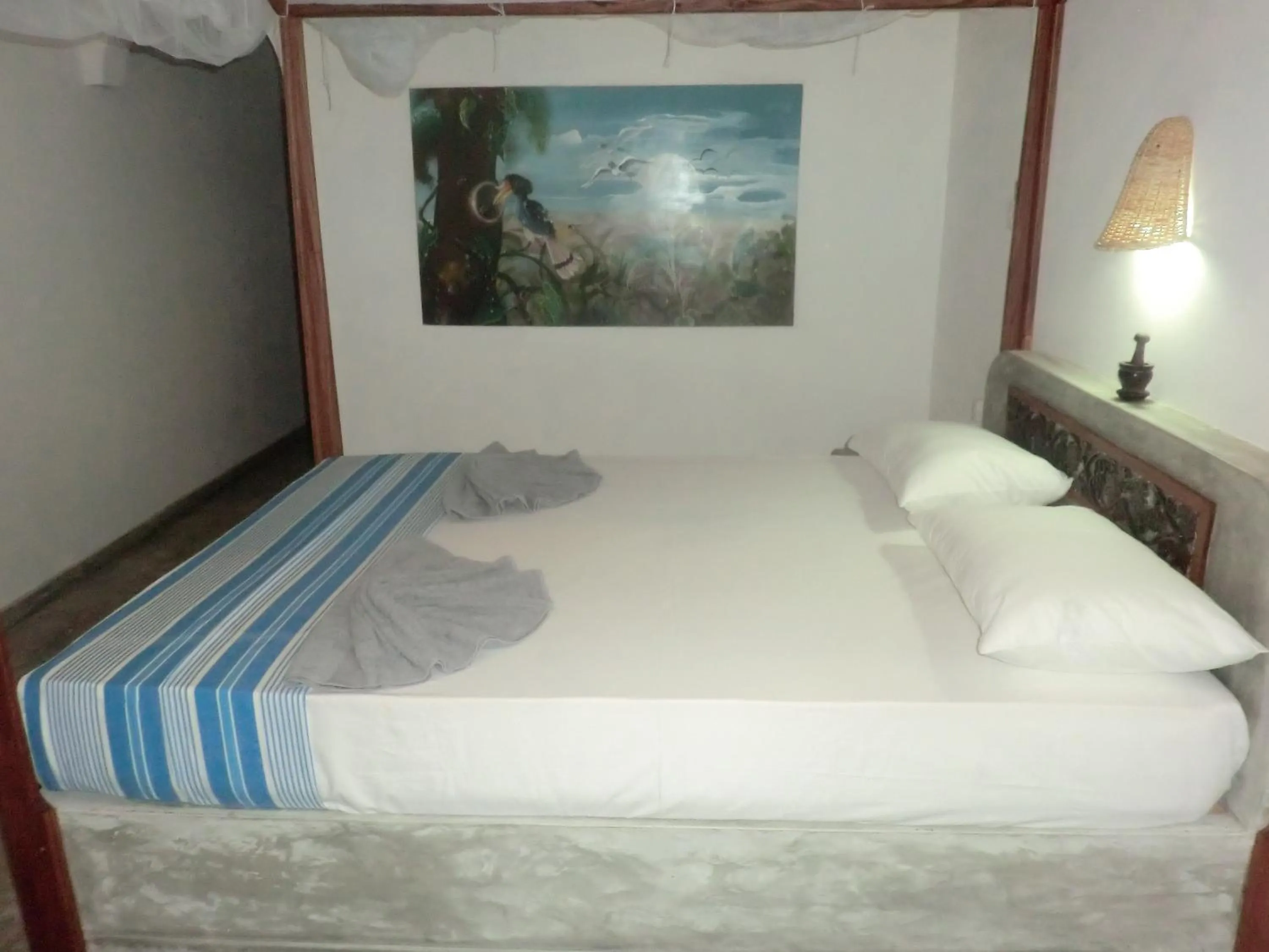 Bed in Peacock Wings Guest