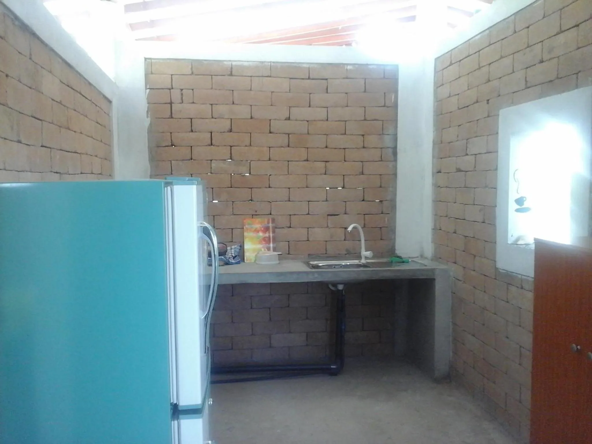 Kitchen or kitchenette in Peacock Wings Guest