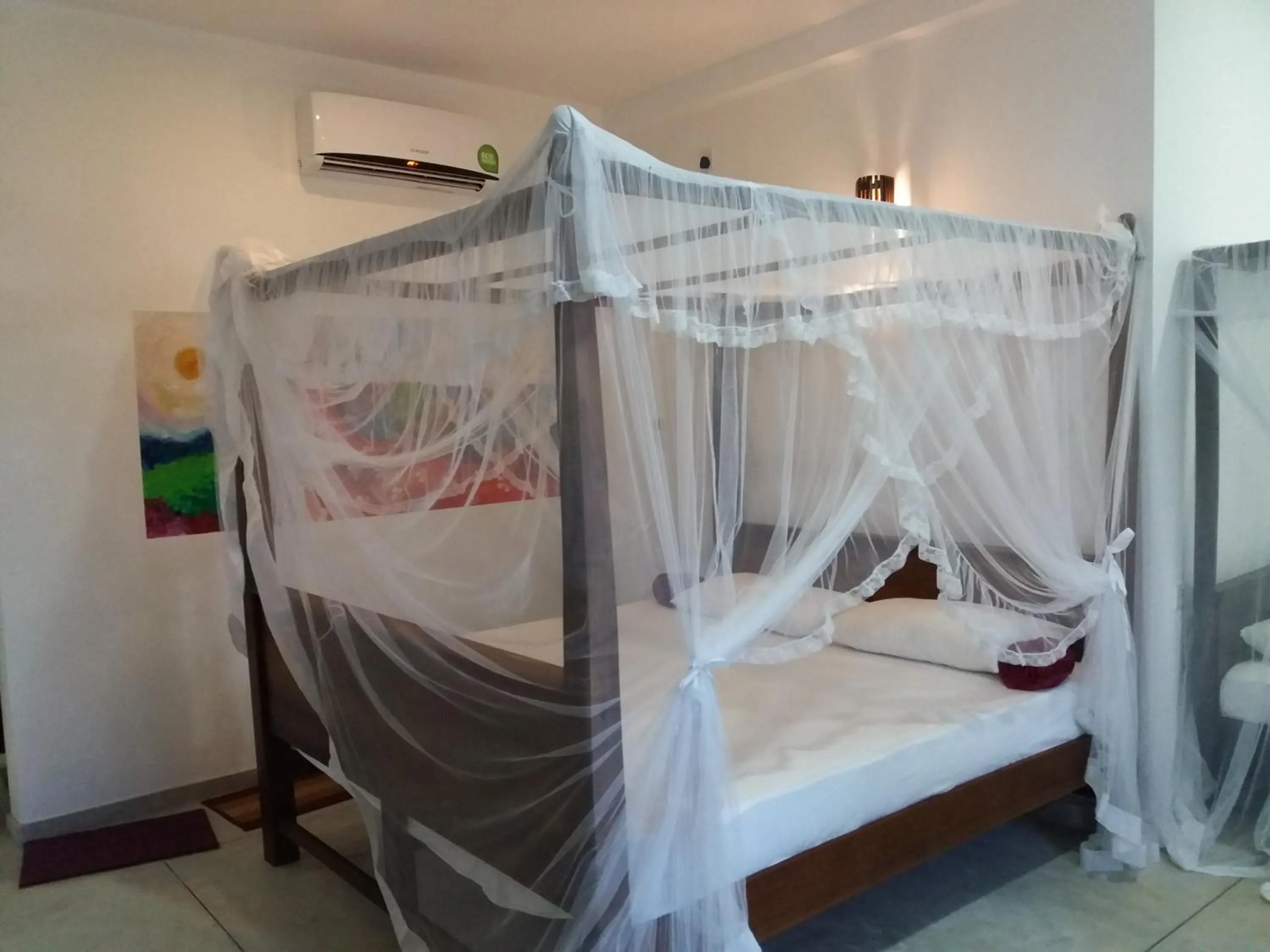 Photo of the whole room, Bed in Peacock Wings Guest