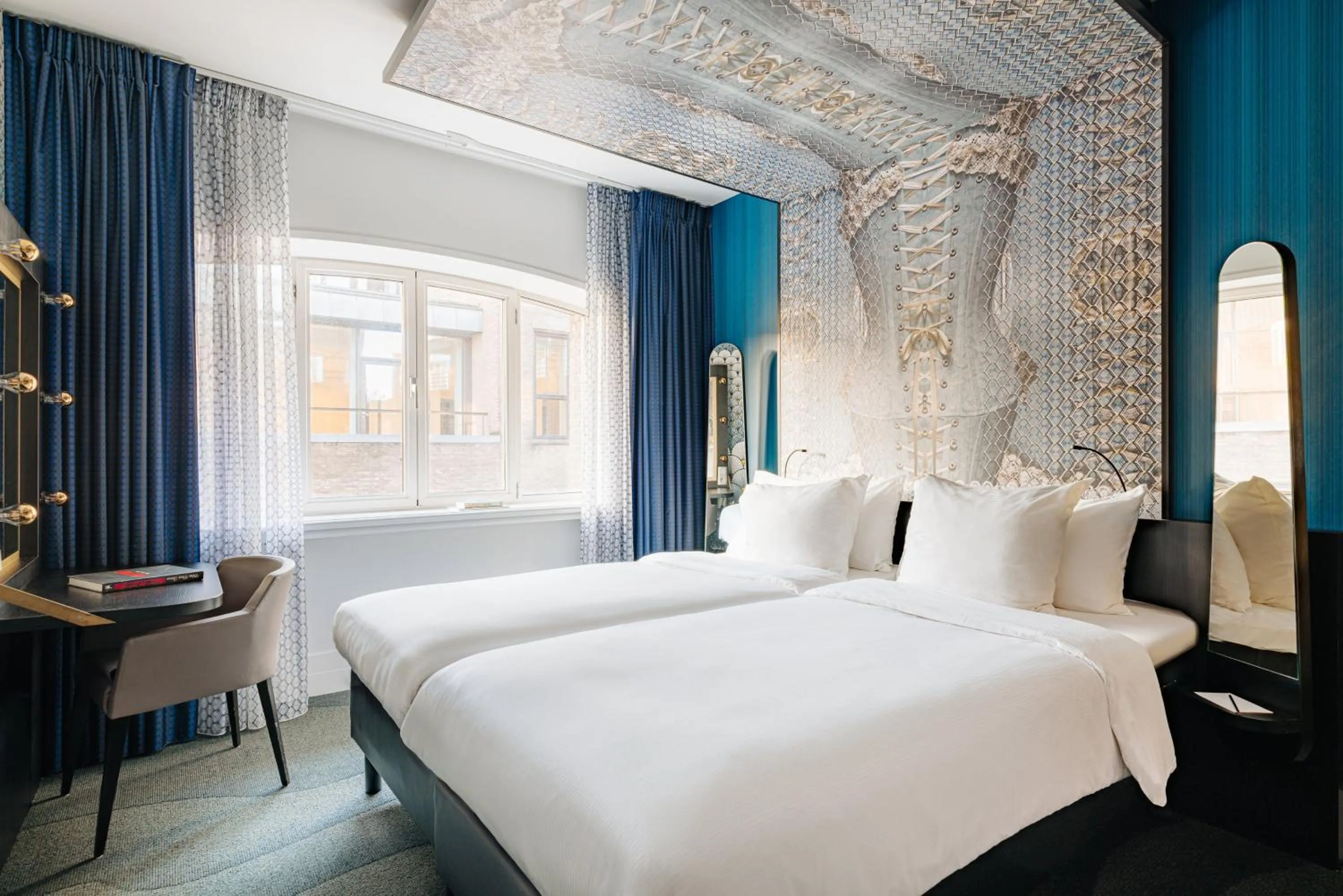 Photo of the whole room, Bed in NYX Hotel Amsterdam Rembrandt Square
