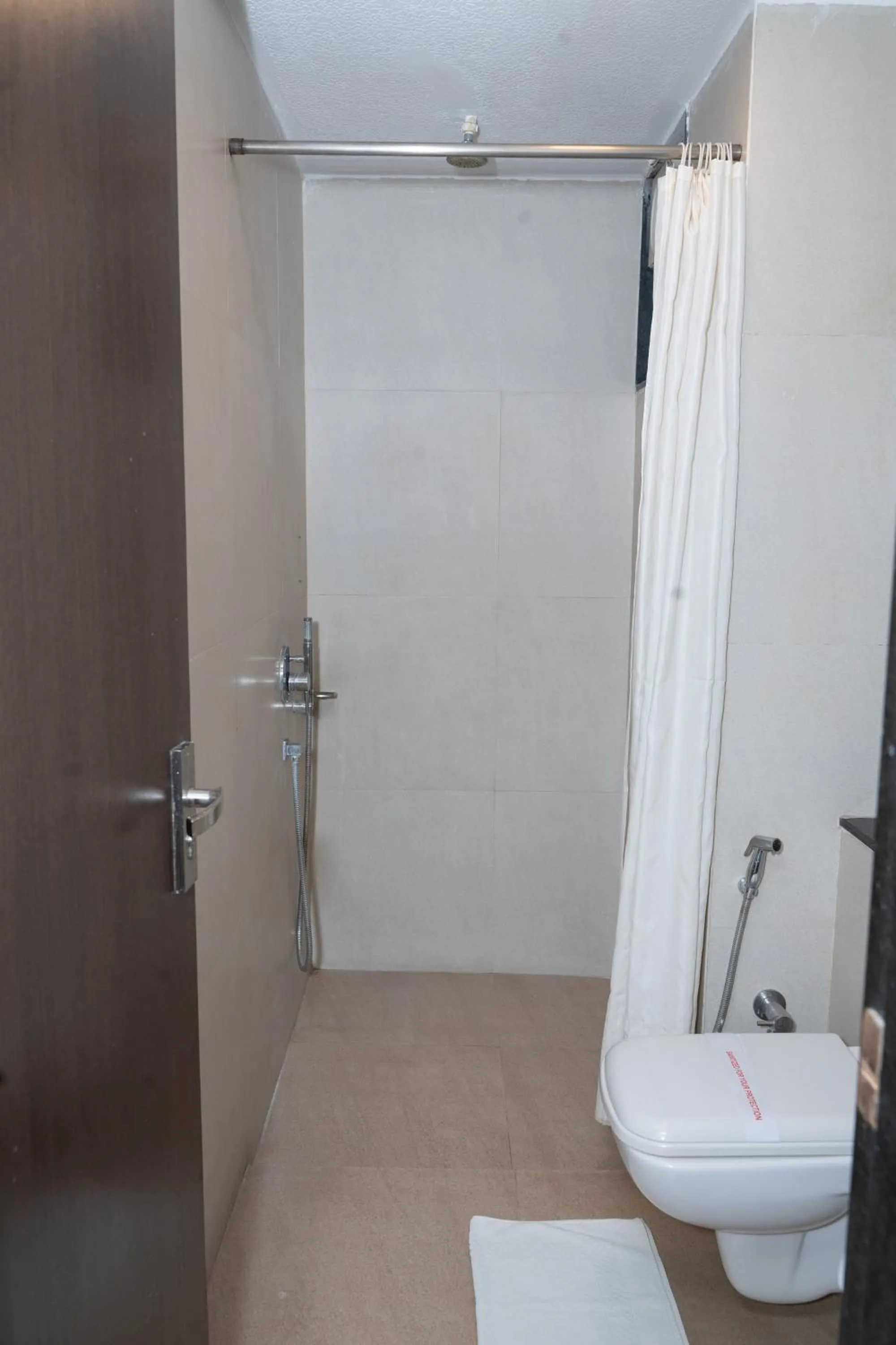 Toilet in Hotel Executive Silver Inn