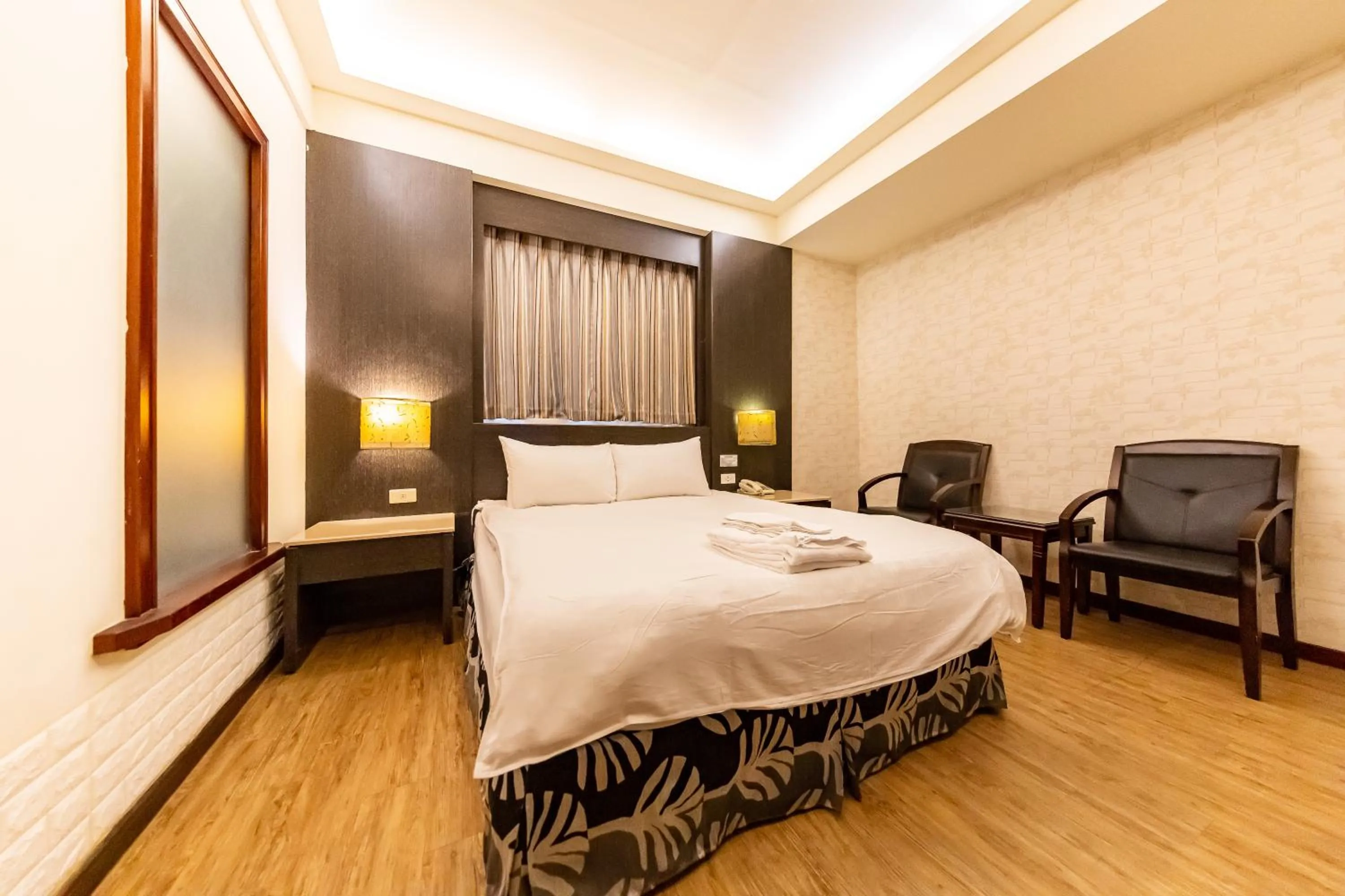 Bed in I HI Sanduo Travel Hotel