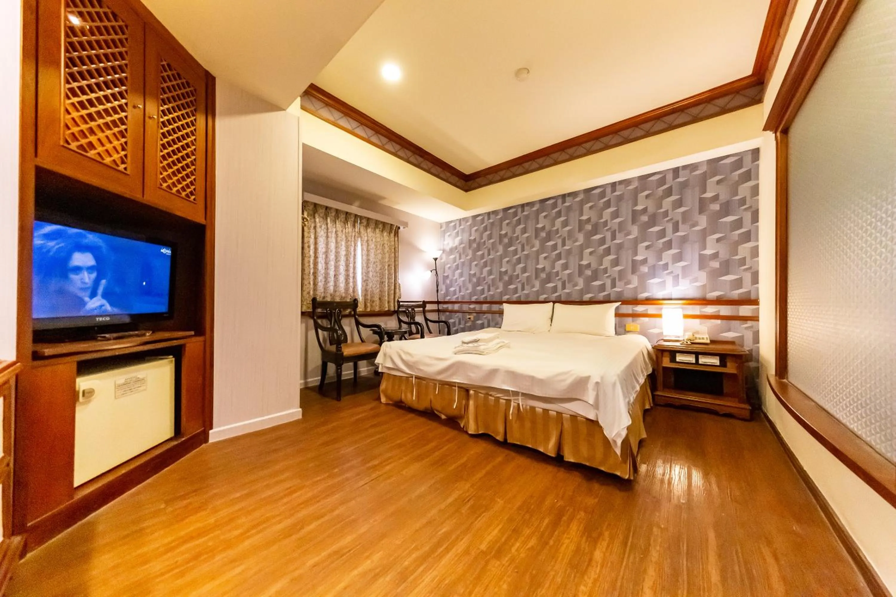 Bed in I HI Sanduo Travel Hotel