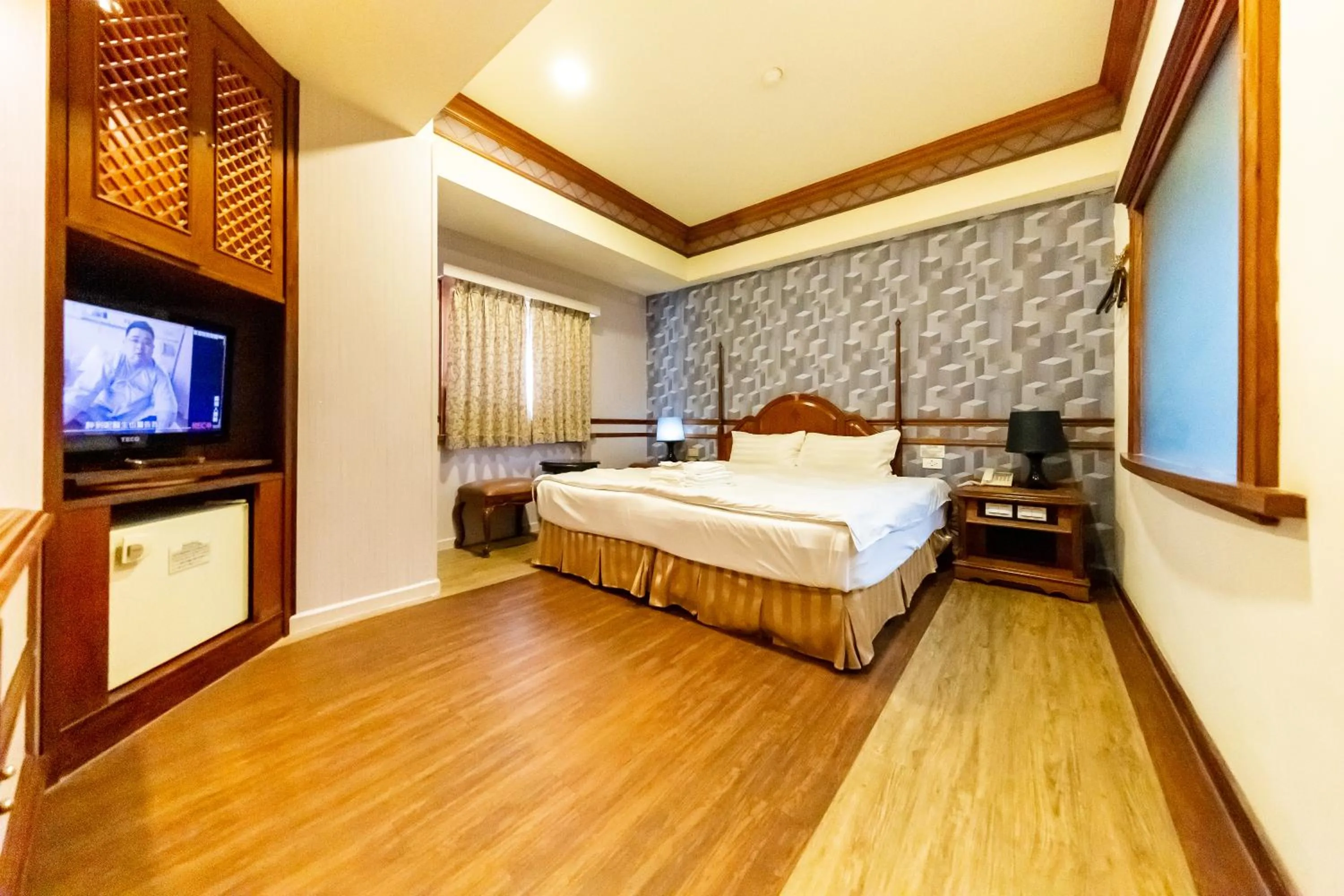 Bed in I HI Sanduo Travel Hotel