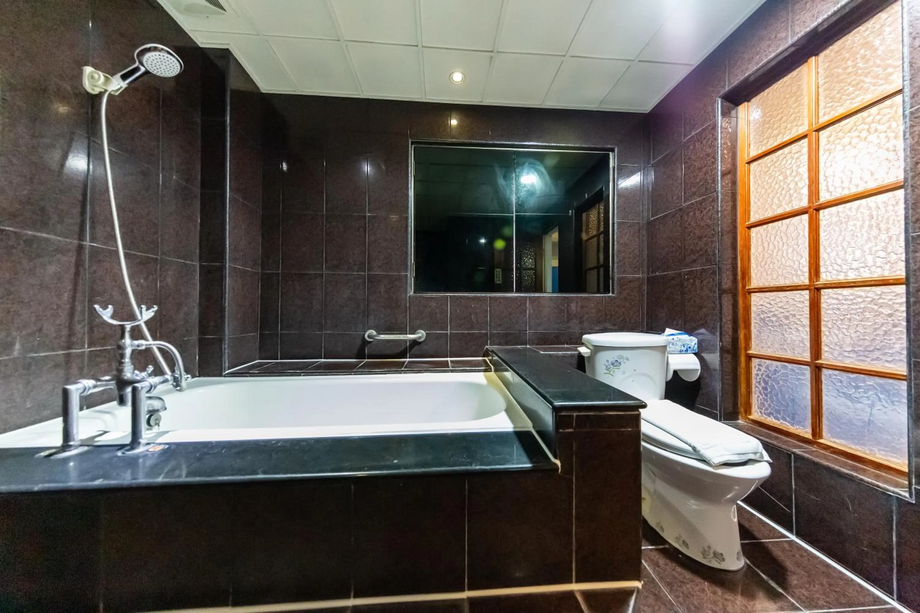 Bathroom in I HI Sanduo Travel Hotel