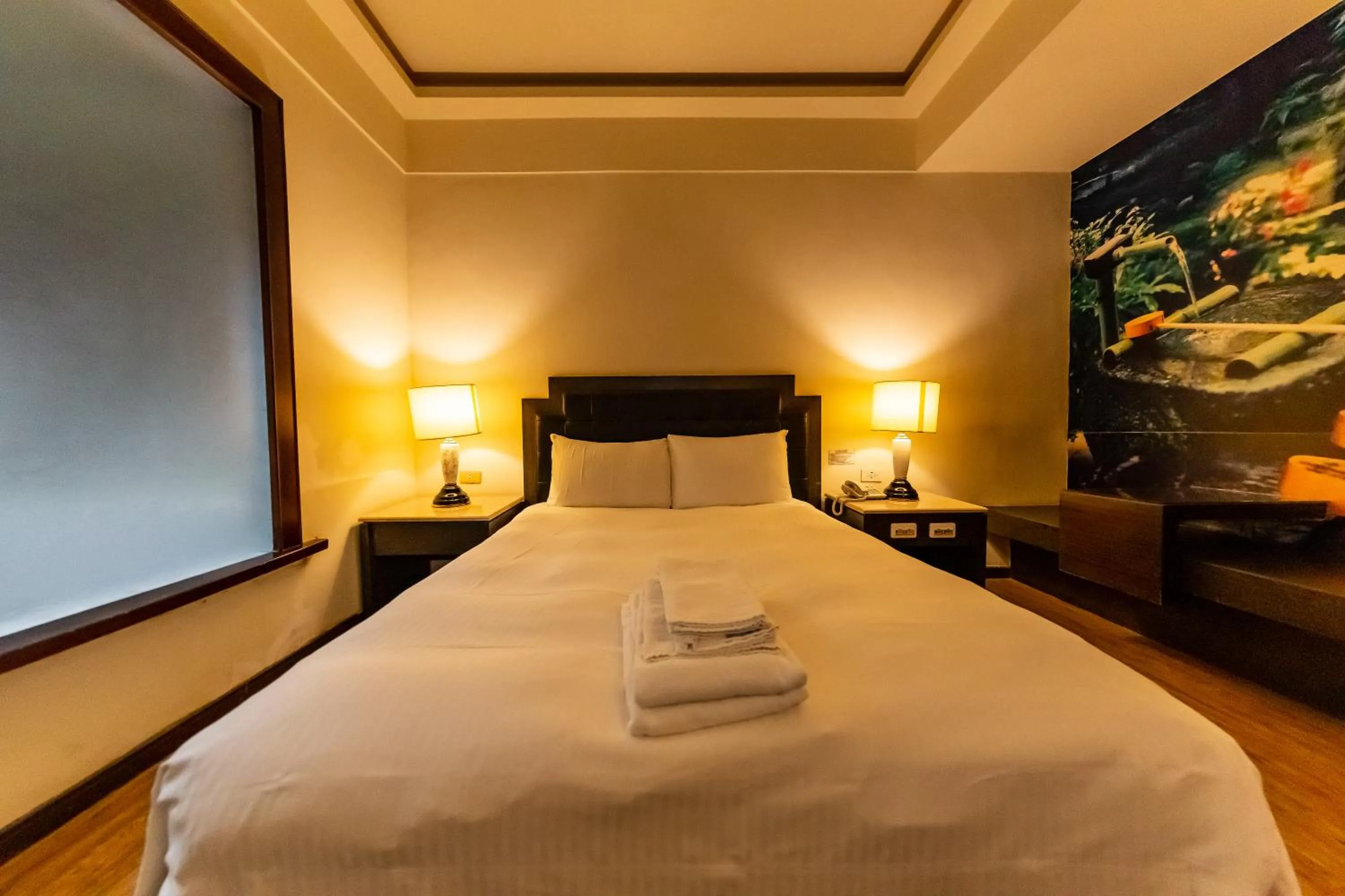 Bed in I HI Sanduo Travel Hotel