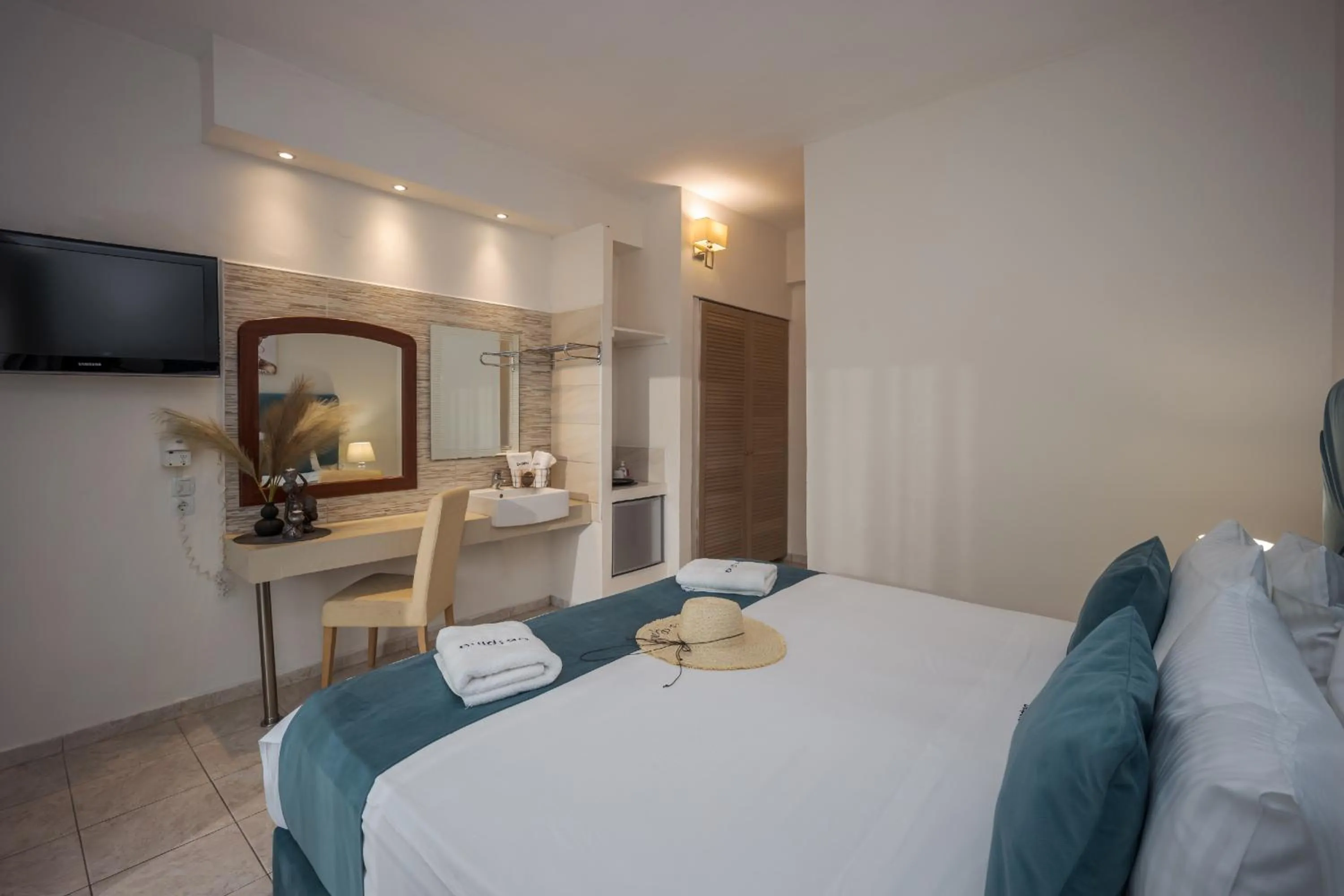 Bed in Despina Aparthotel by Philoxenia Hotel & SPA