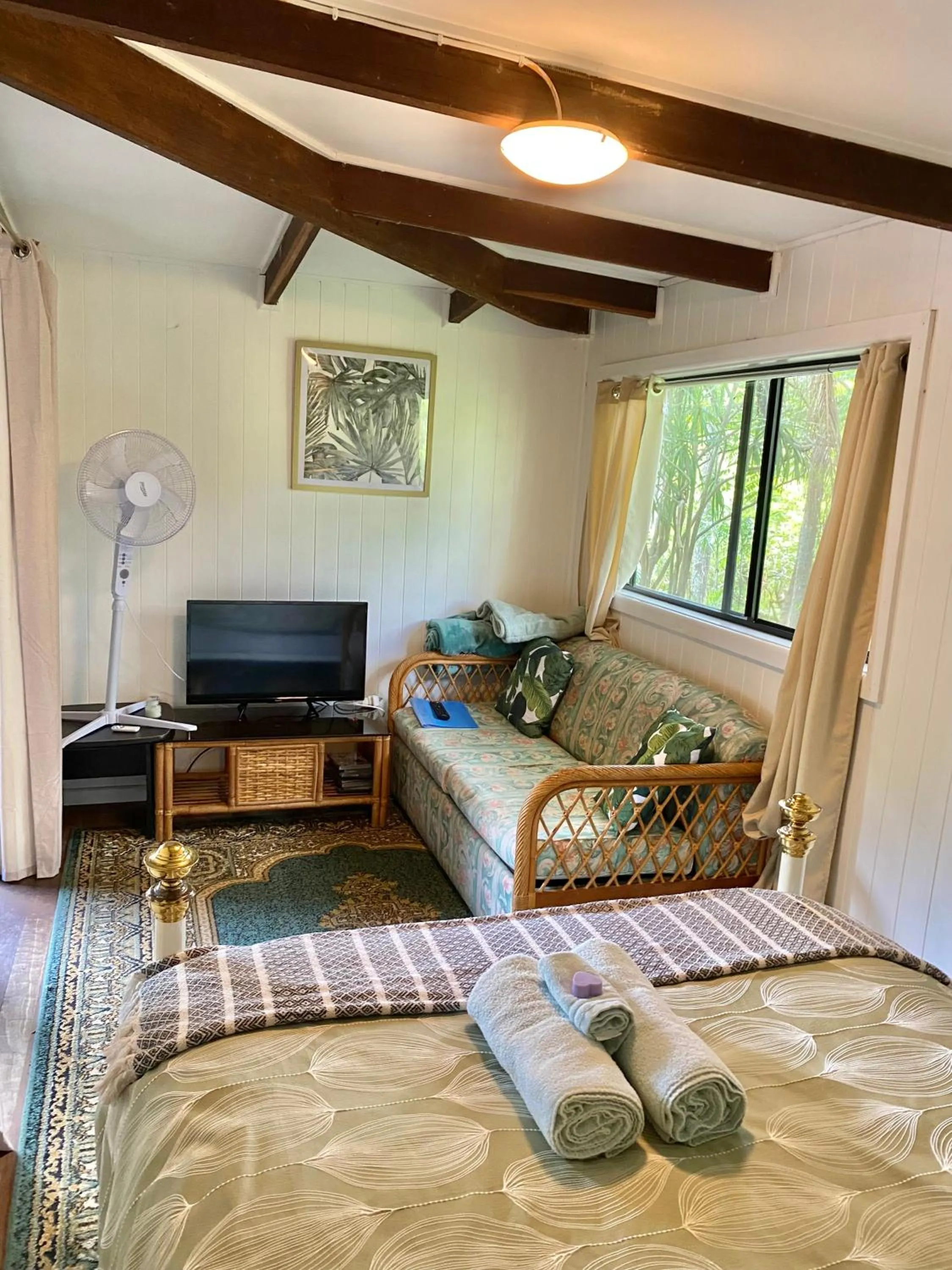 Bed in Nimbin waterfall retreat