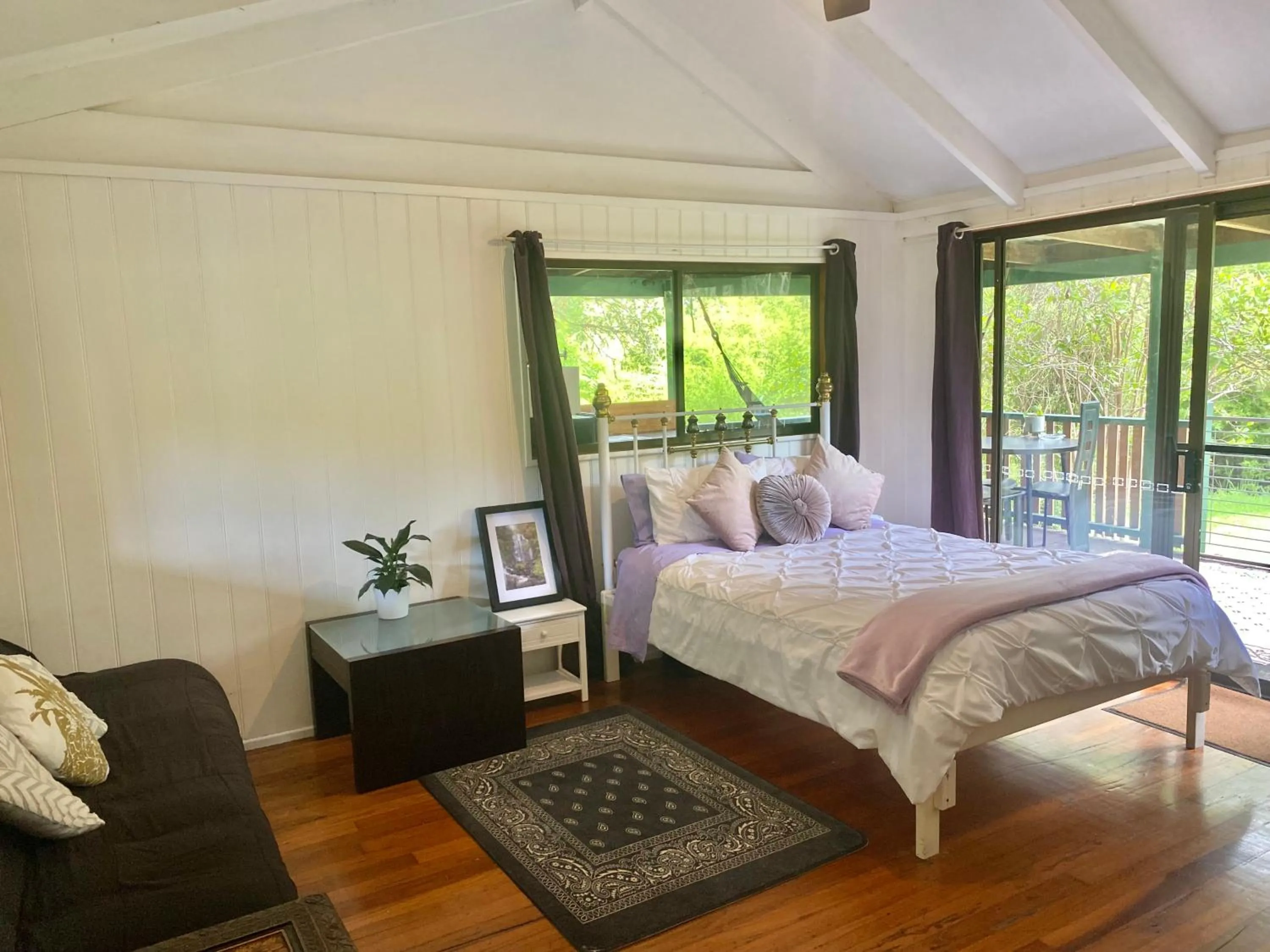 Bed in Nimbin waterfall retreat